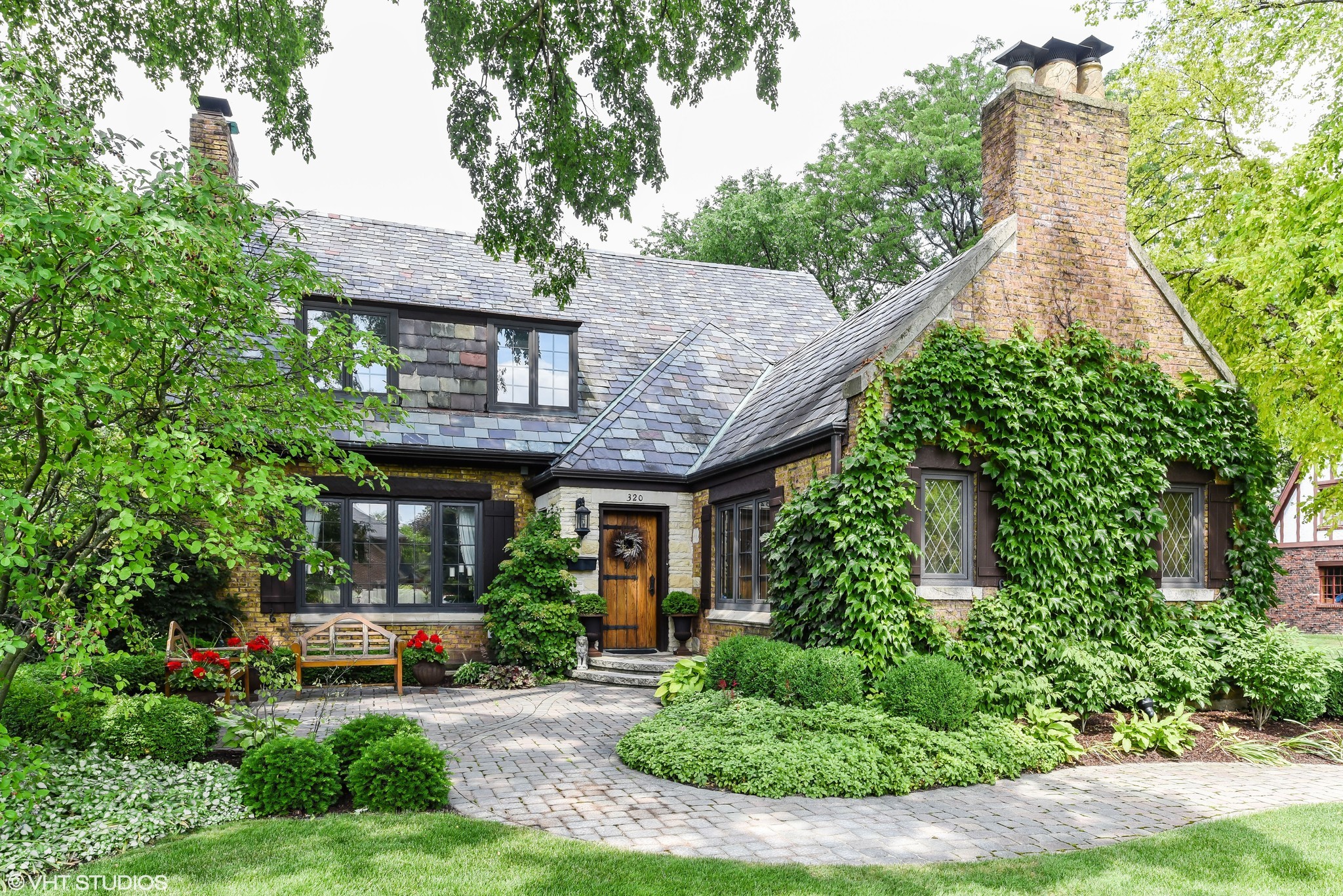 Elmhurst Tudor with vine-covered courtyard: $1.5M - Chicago Tribune