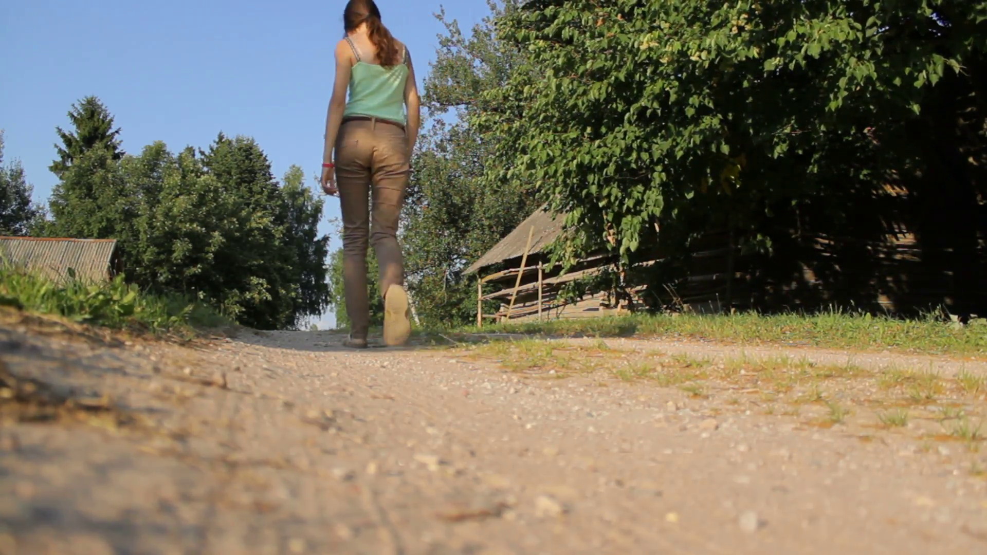 Girl walking down the road in the country in summer Stock Video ...