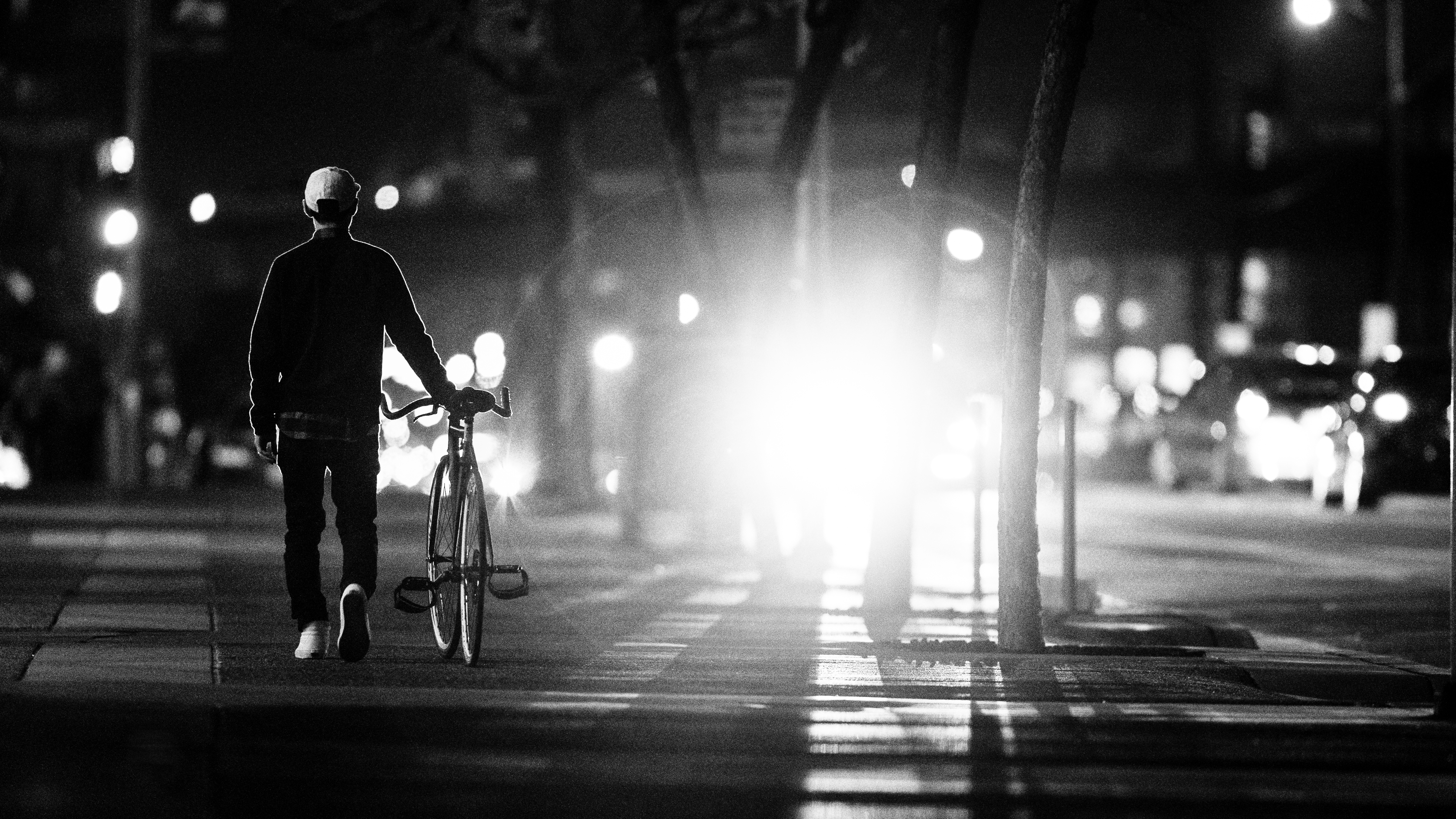 Walking the bike in the city photo