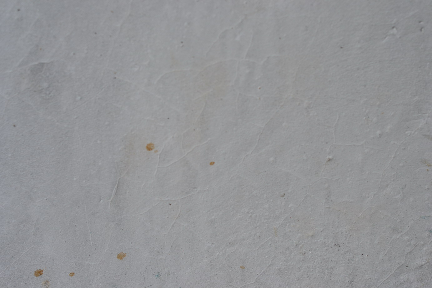 Wall texture with white paint, crack and photo