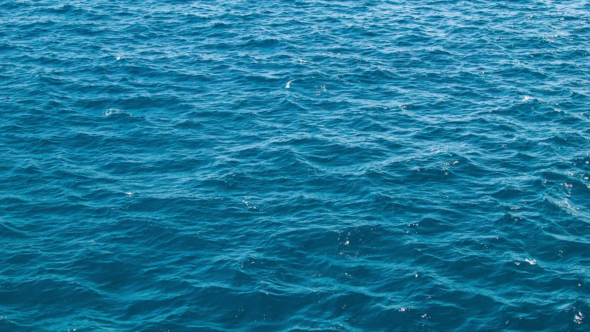 Detailed Blue Sea Water Closeup with Smooth Movement During Good ...