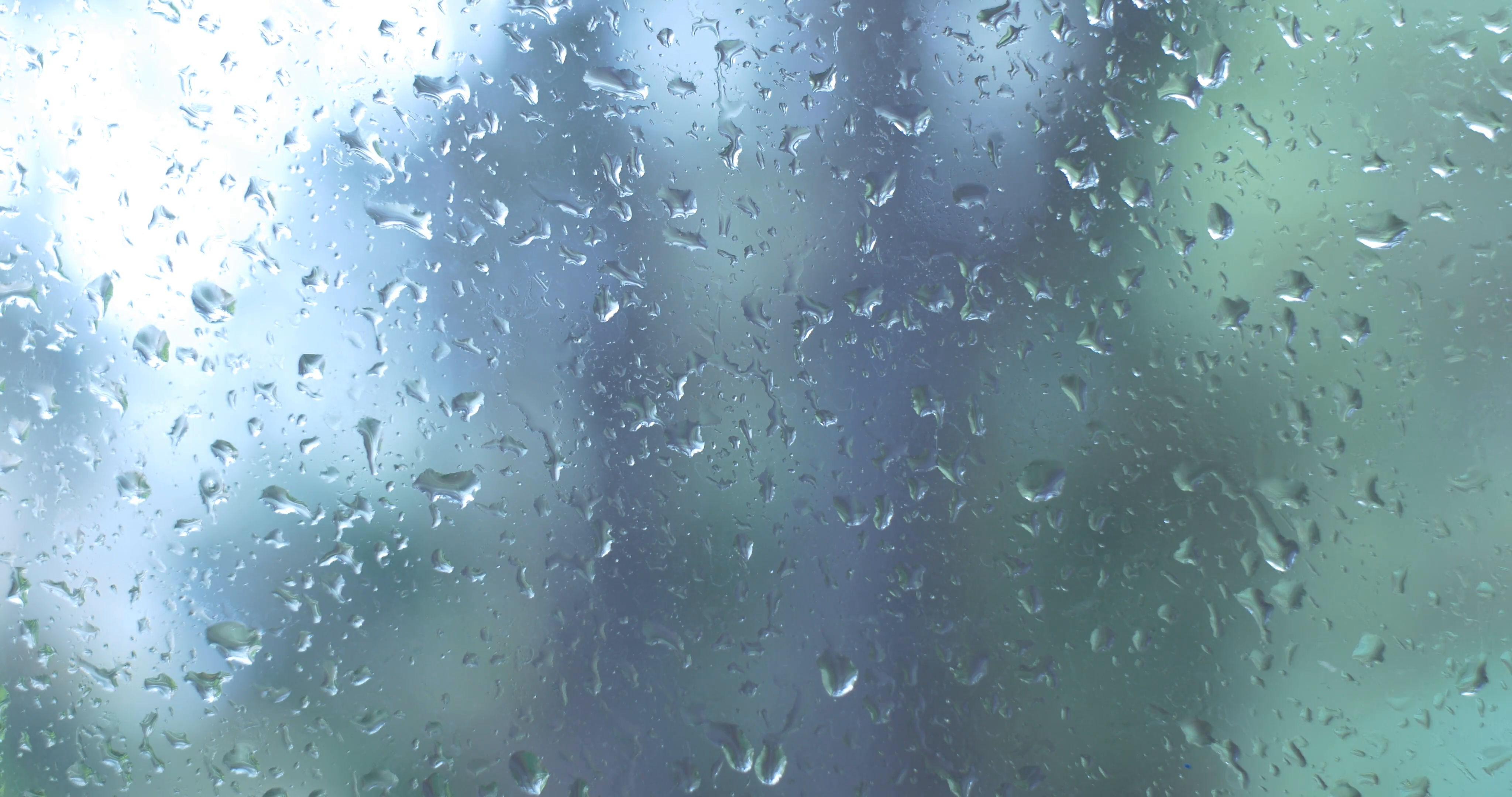Water Rain drops on window glass wet weather Stock Video Footage ...