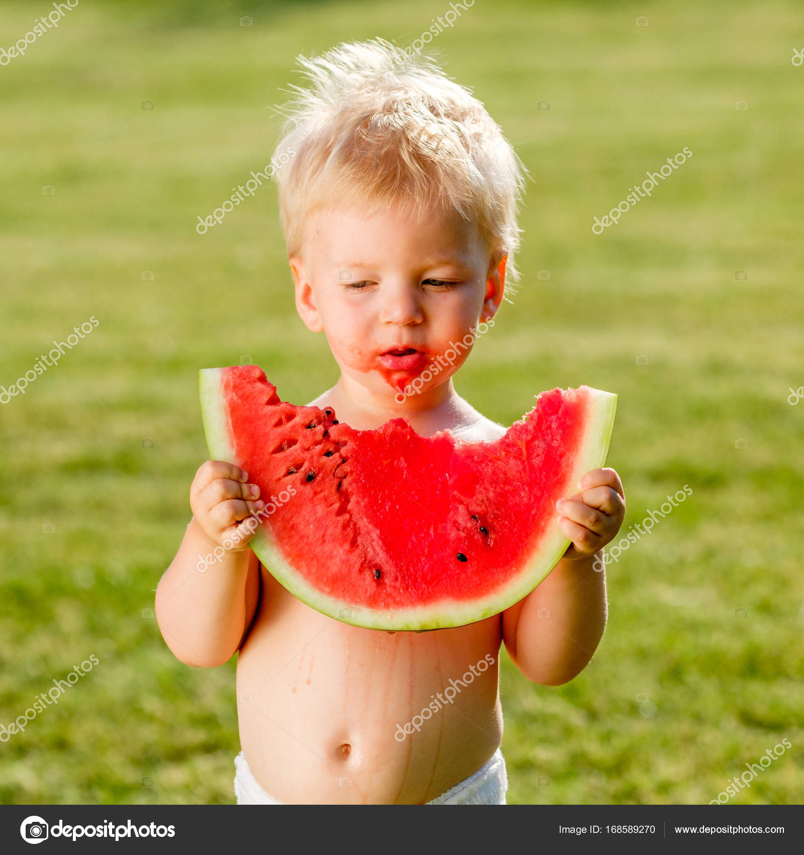 Baby boy eating watermelon — Stock Photo © haveseen #168589270