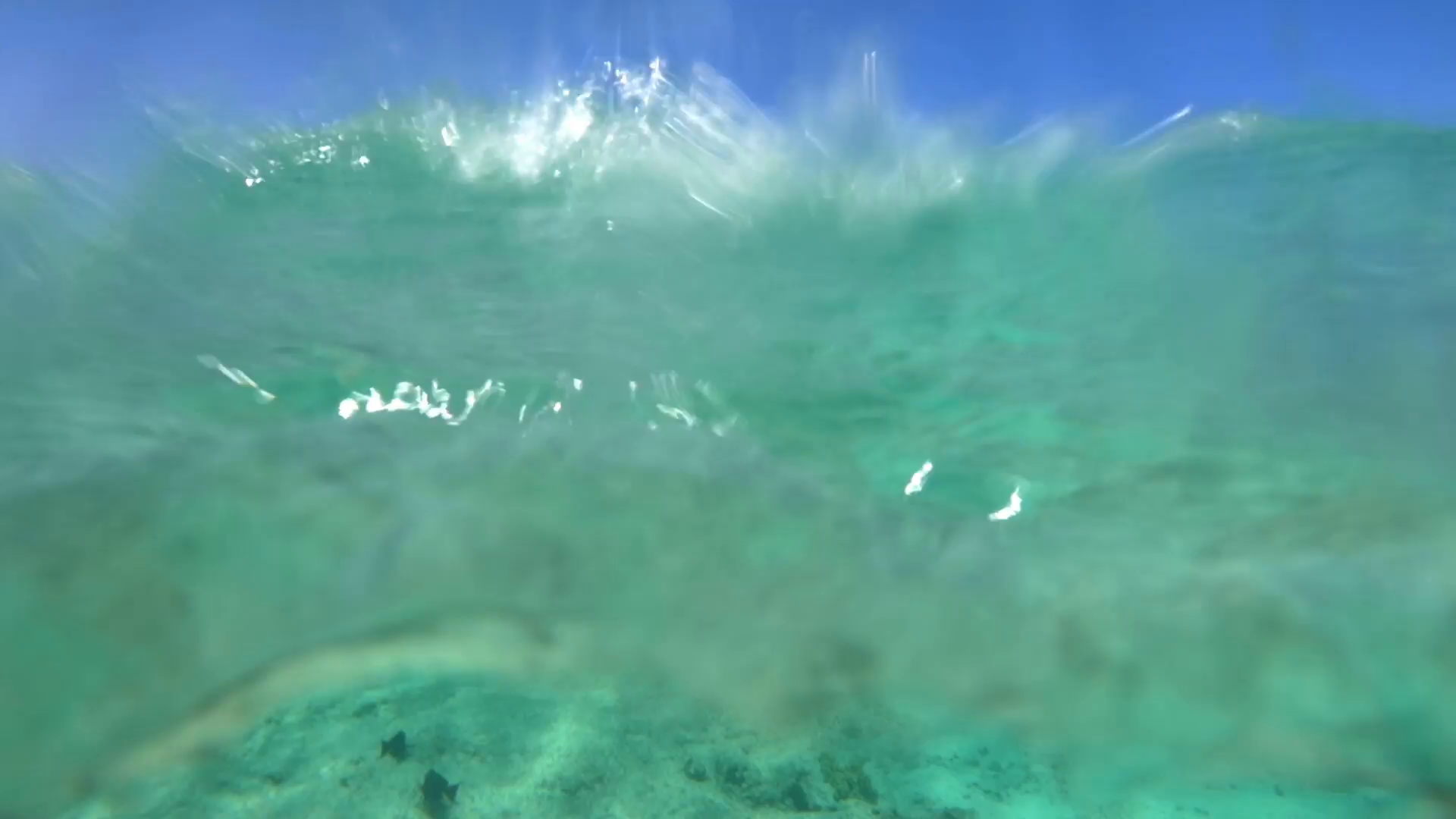 Slow motion shot of wavy sea surface. Rolling waves are coming on ...