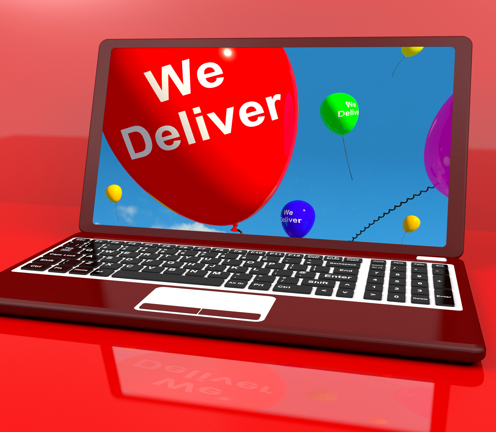 We deliver balloons on computer showing delivery shipping service or l photo