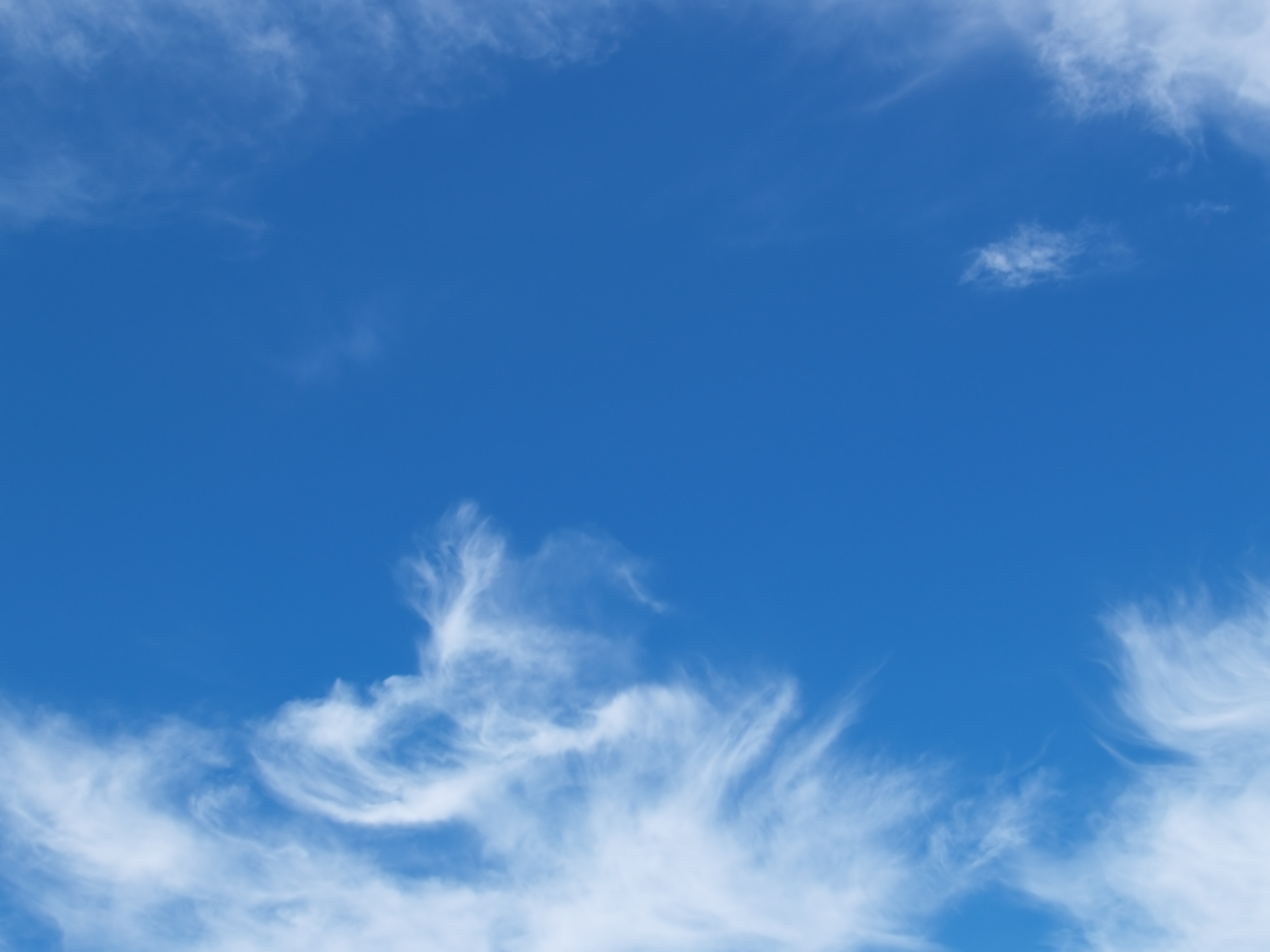 White and blue cloudy sky photo