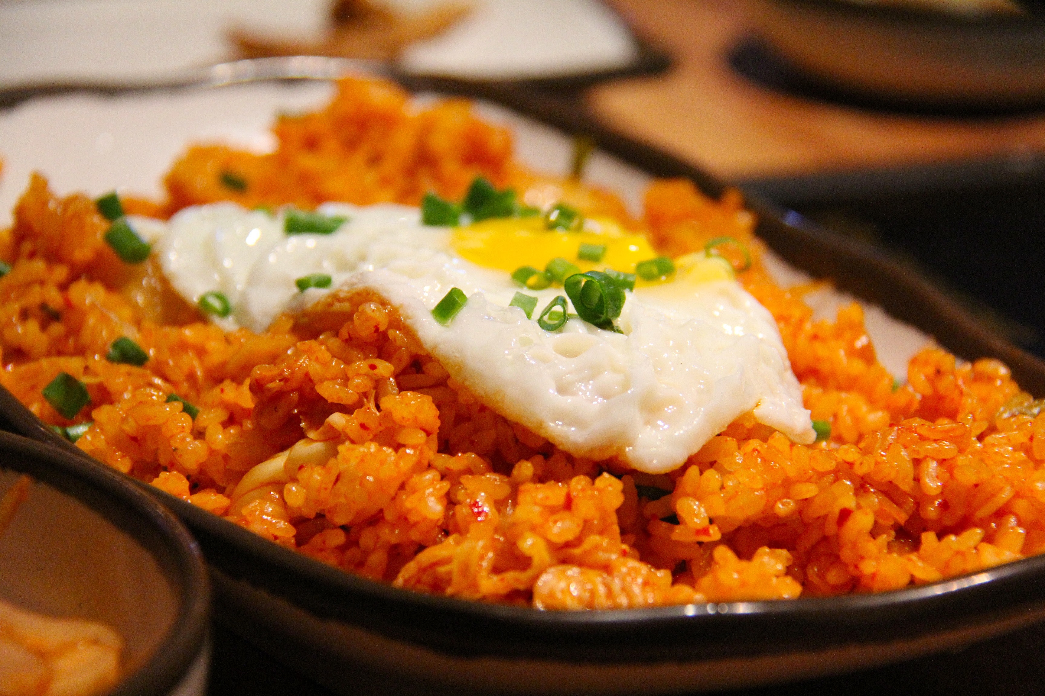White and yellow sunny side up egg on fried rice photo