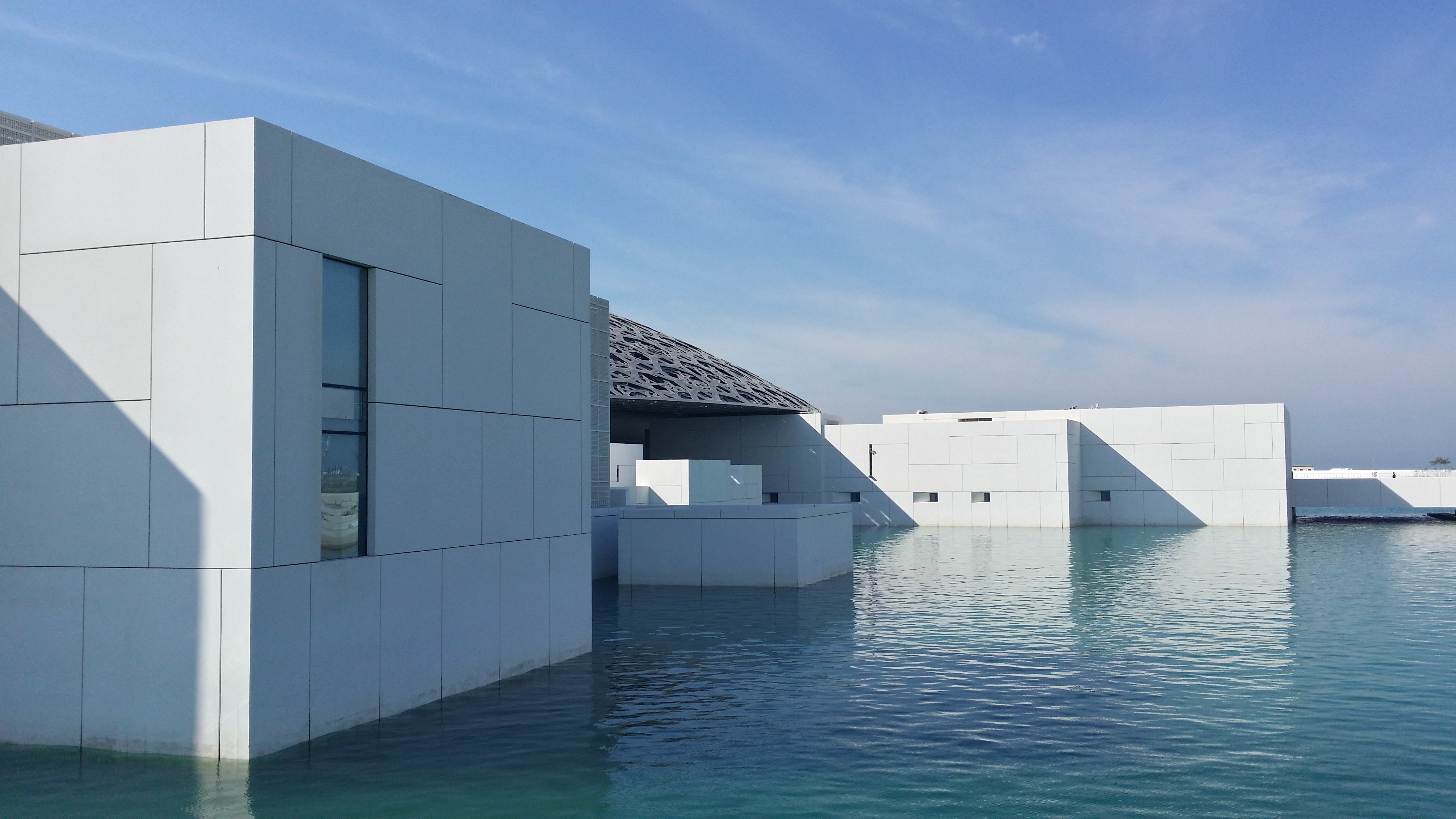 White building surrounded with water photo