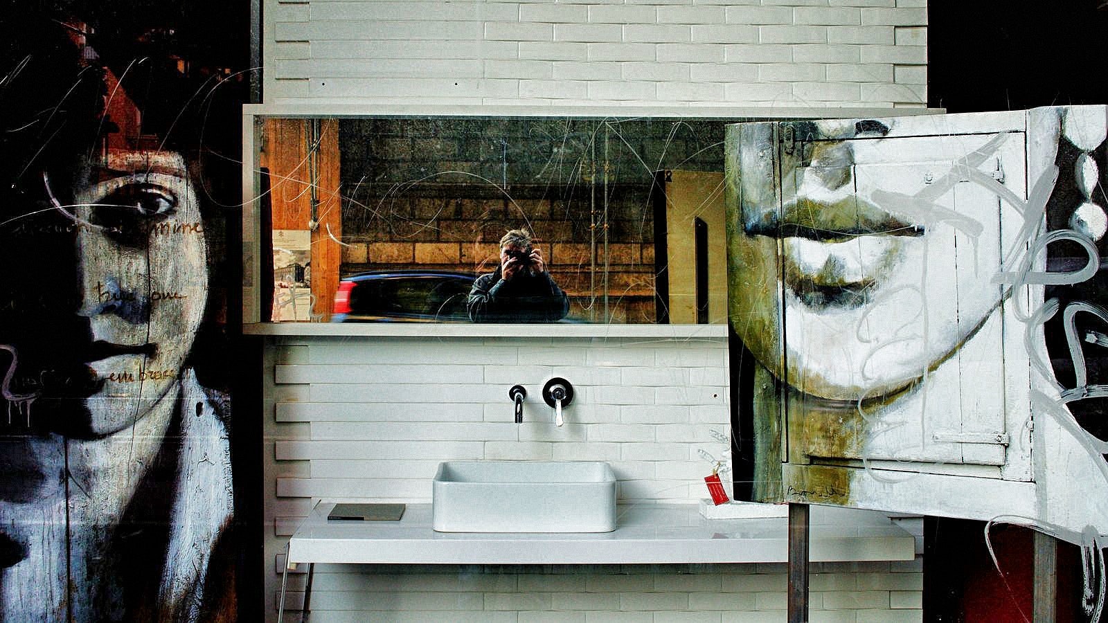 White ceramic rectangular sink under white wooden frame rectangular mirror photo