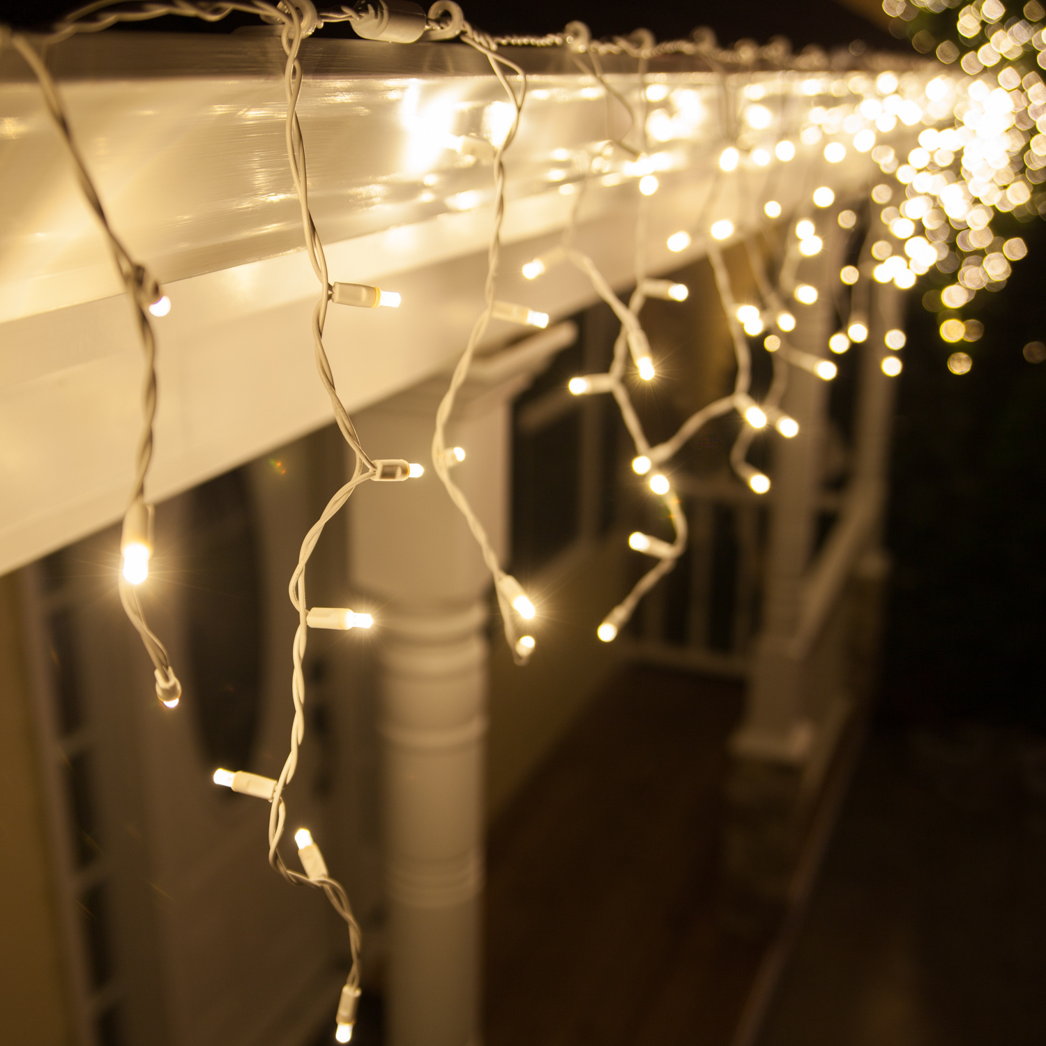 LED Christmas Lights - 70 5mm Warm White Twinkle LED Icicle Lights