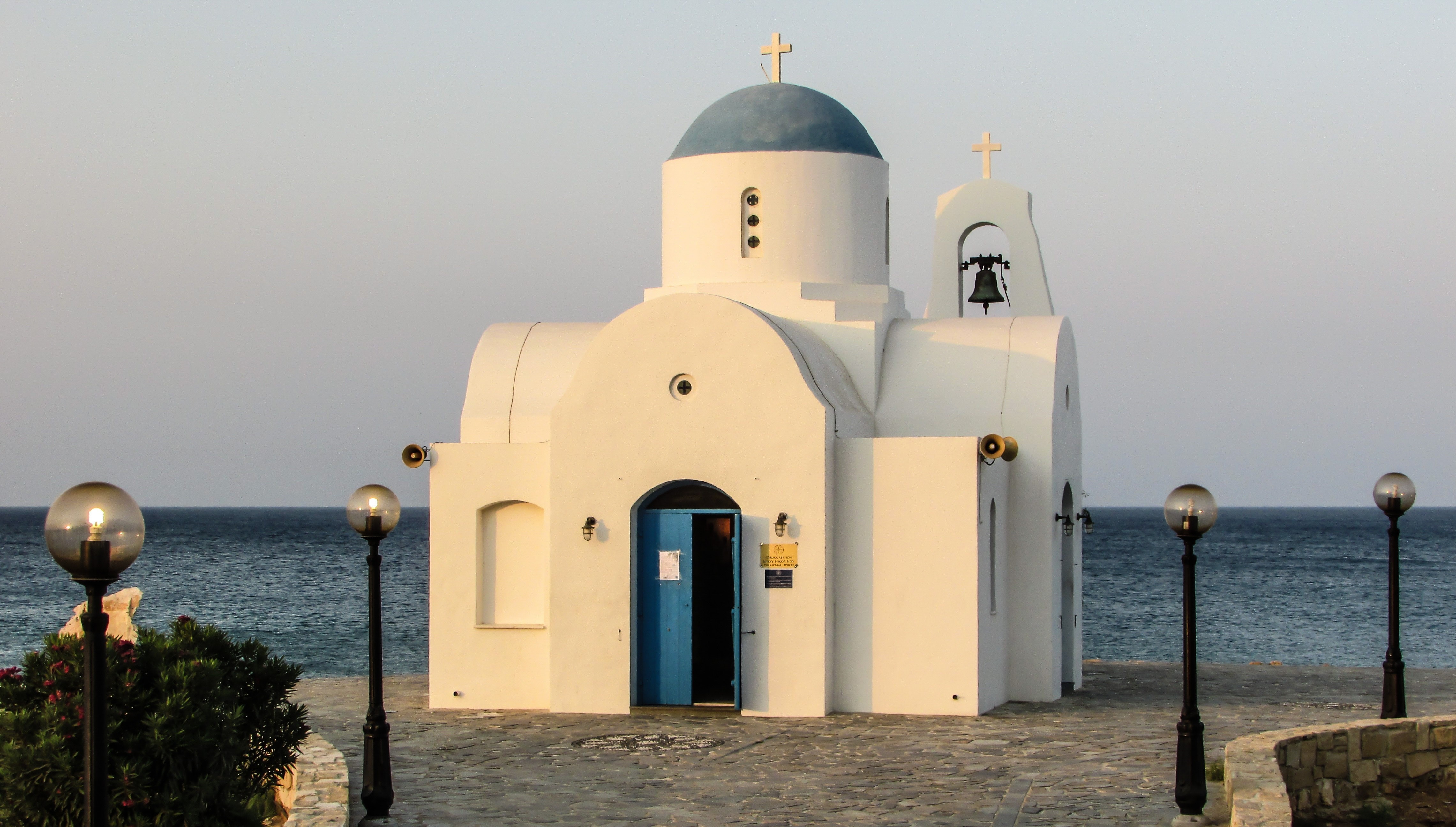 White church photo near ocean