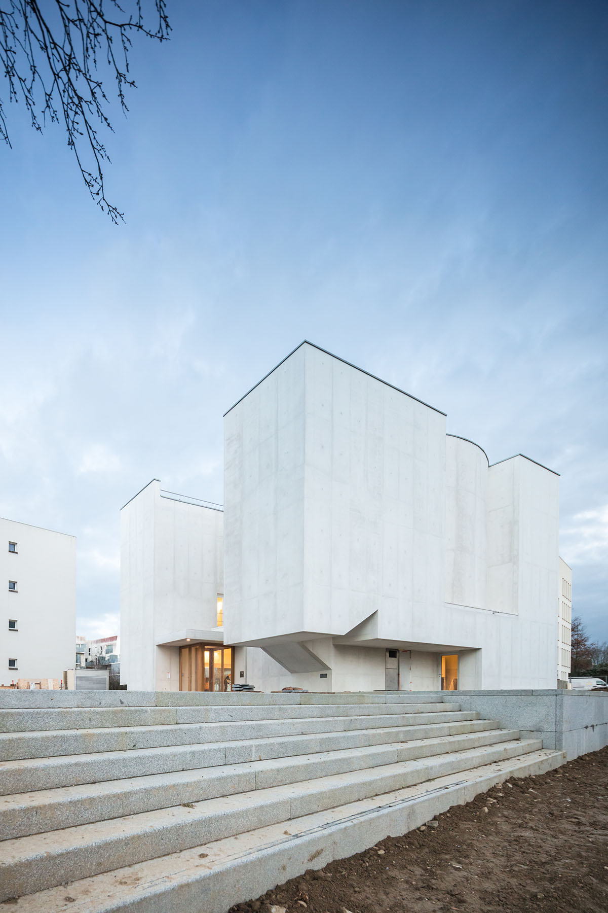 Álvaro Siza Completes His First Church In France with white coloured ...