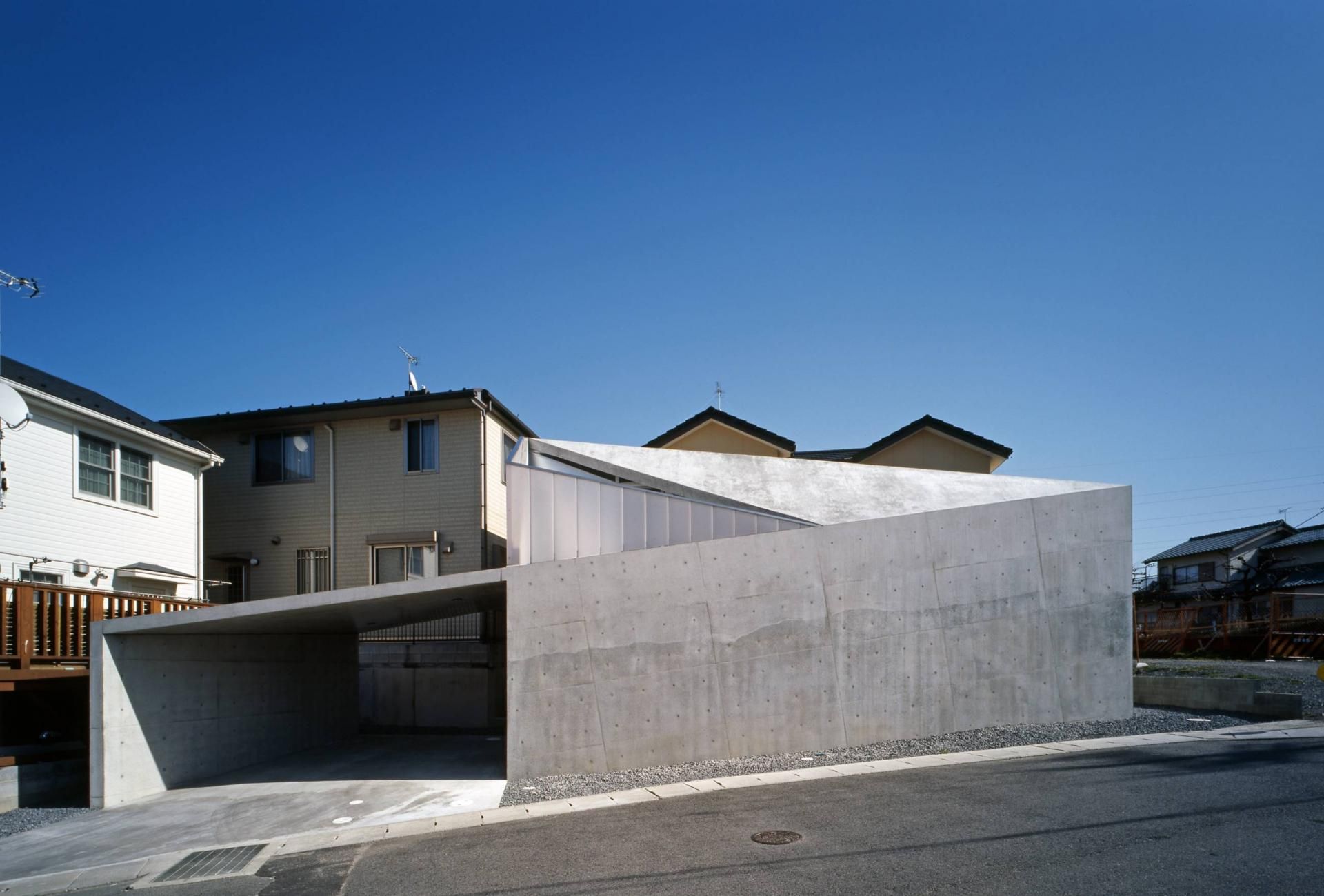 Modern Concrete House Built On A Budget And Featuring An Irregular Shape