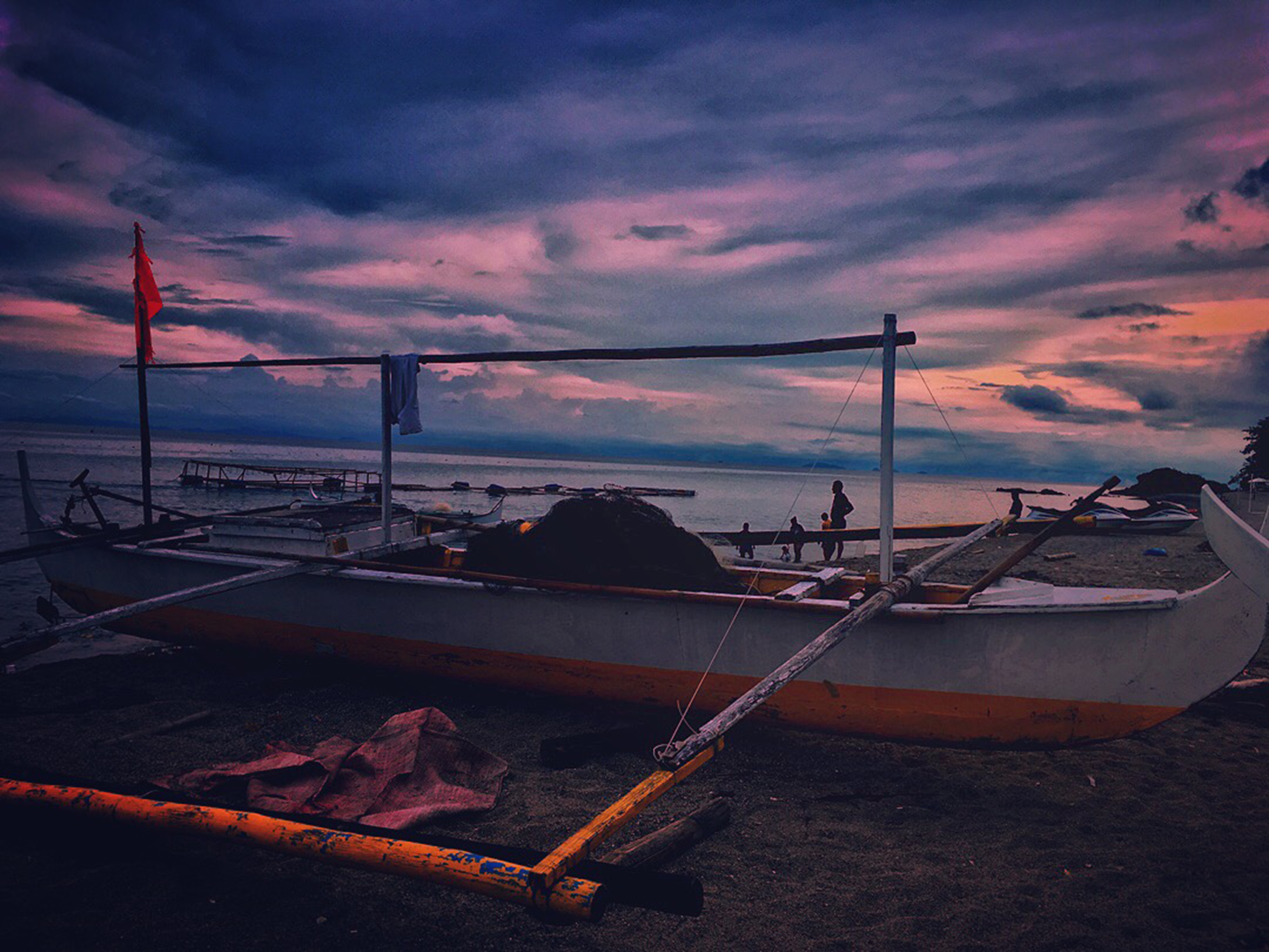 White fishing boat during dawn photo