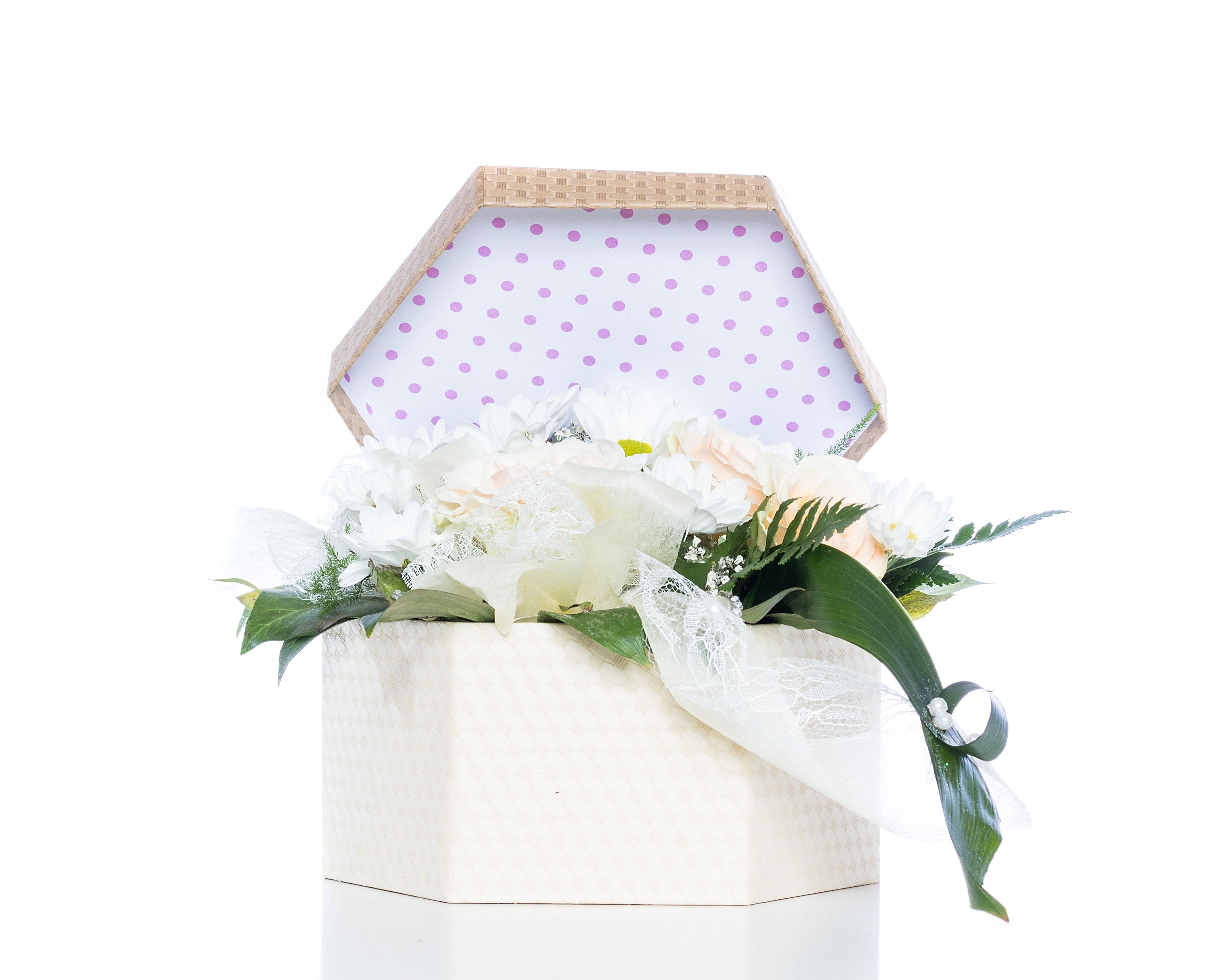White flowers inside gift box photo