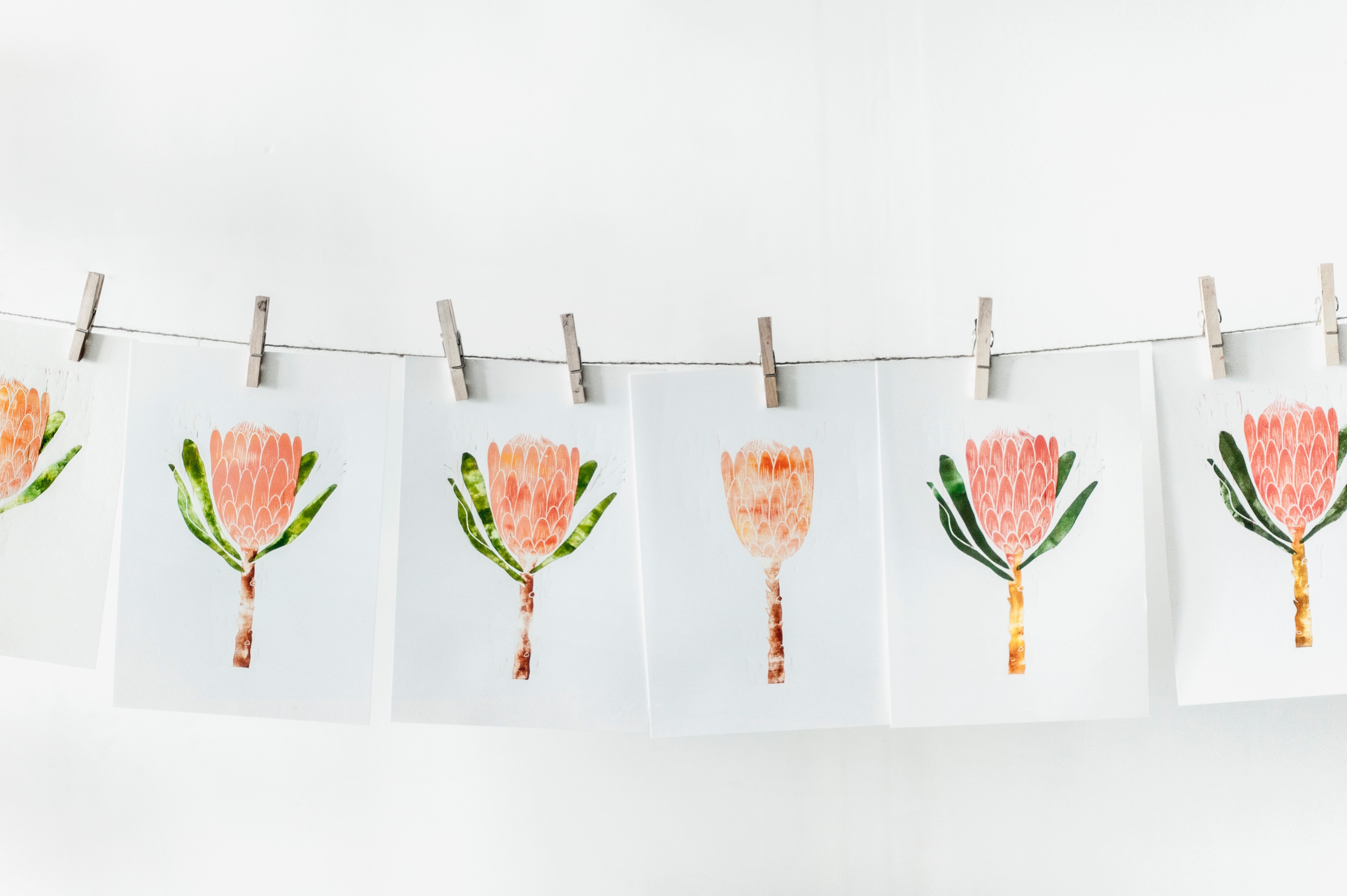 White paper with orange flower print lot photo