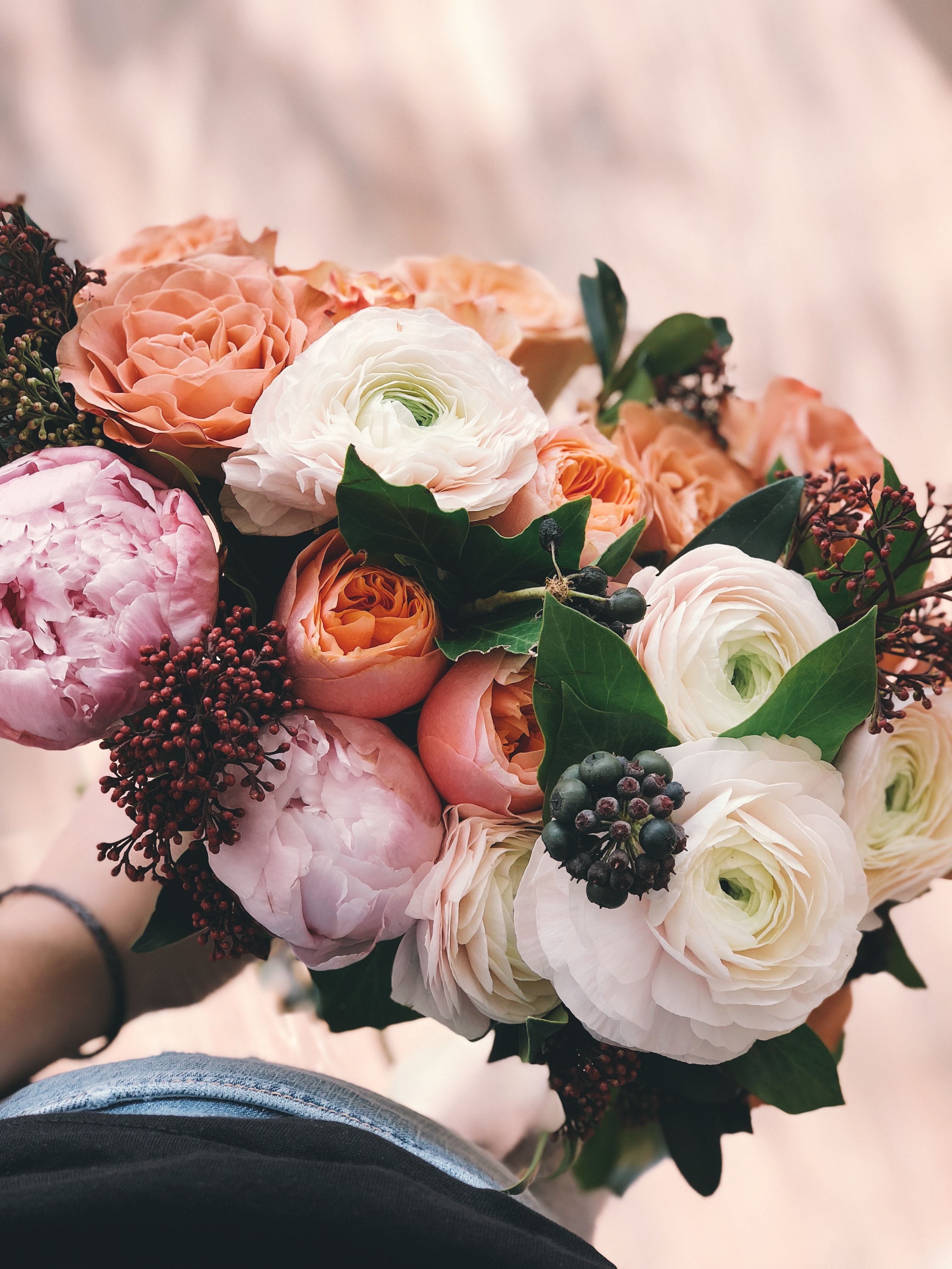 White, pink, and orange rose bouquet photo