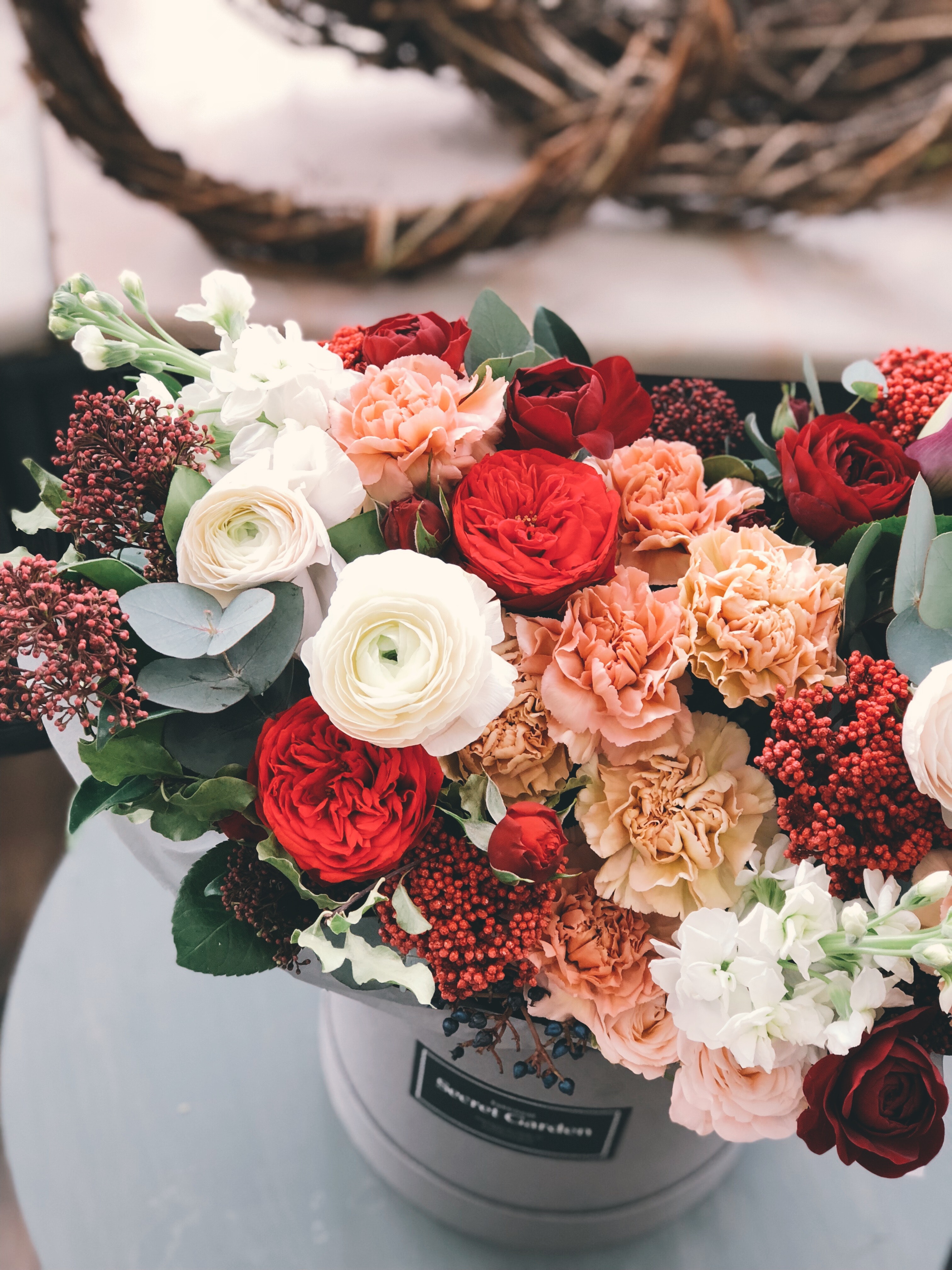 White, red, orange, and brown flowers photo