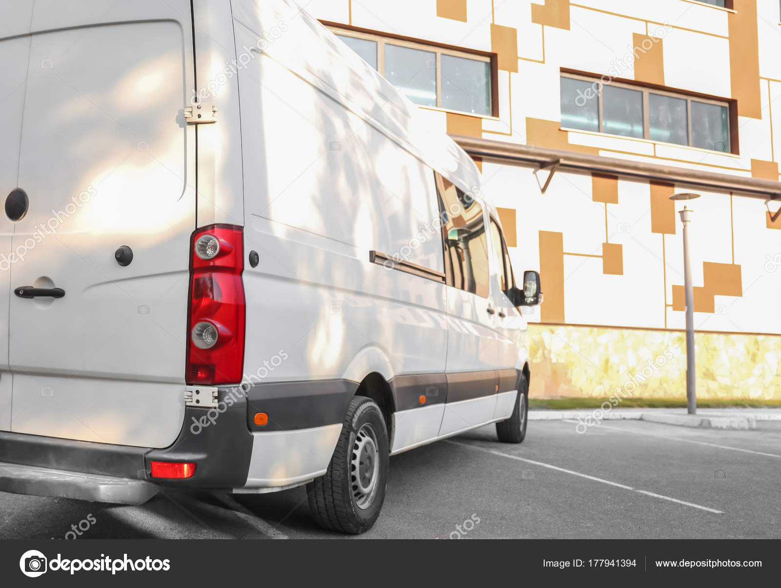 White van parked on street — Stock Photo © belchonock #177941394