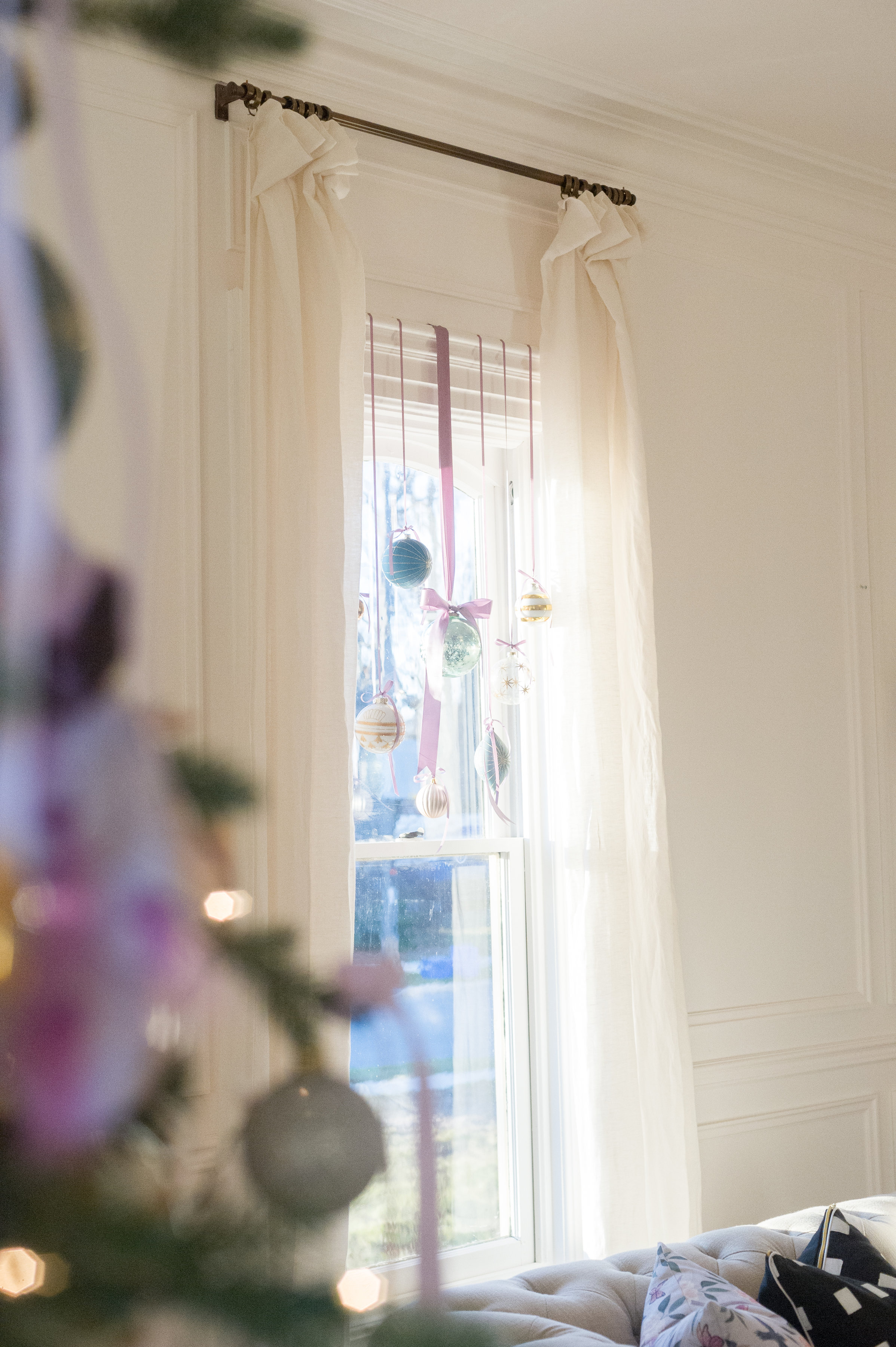 ornaments hung in window - The Leslie Style
