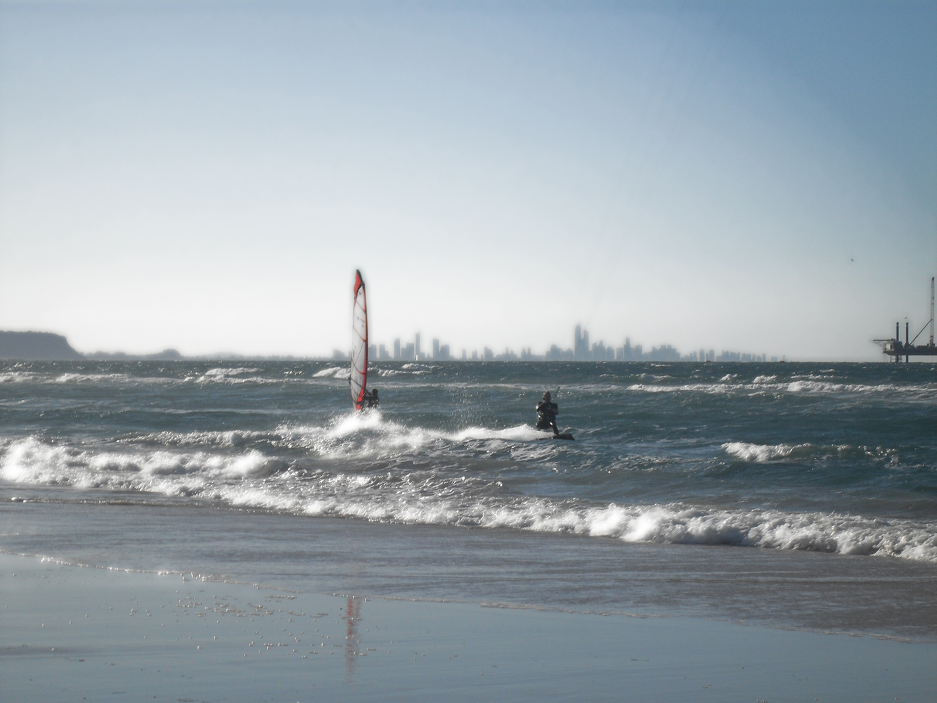 Windsurfer and kitesurfer photo