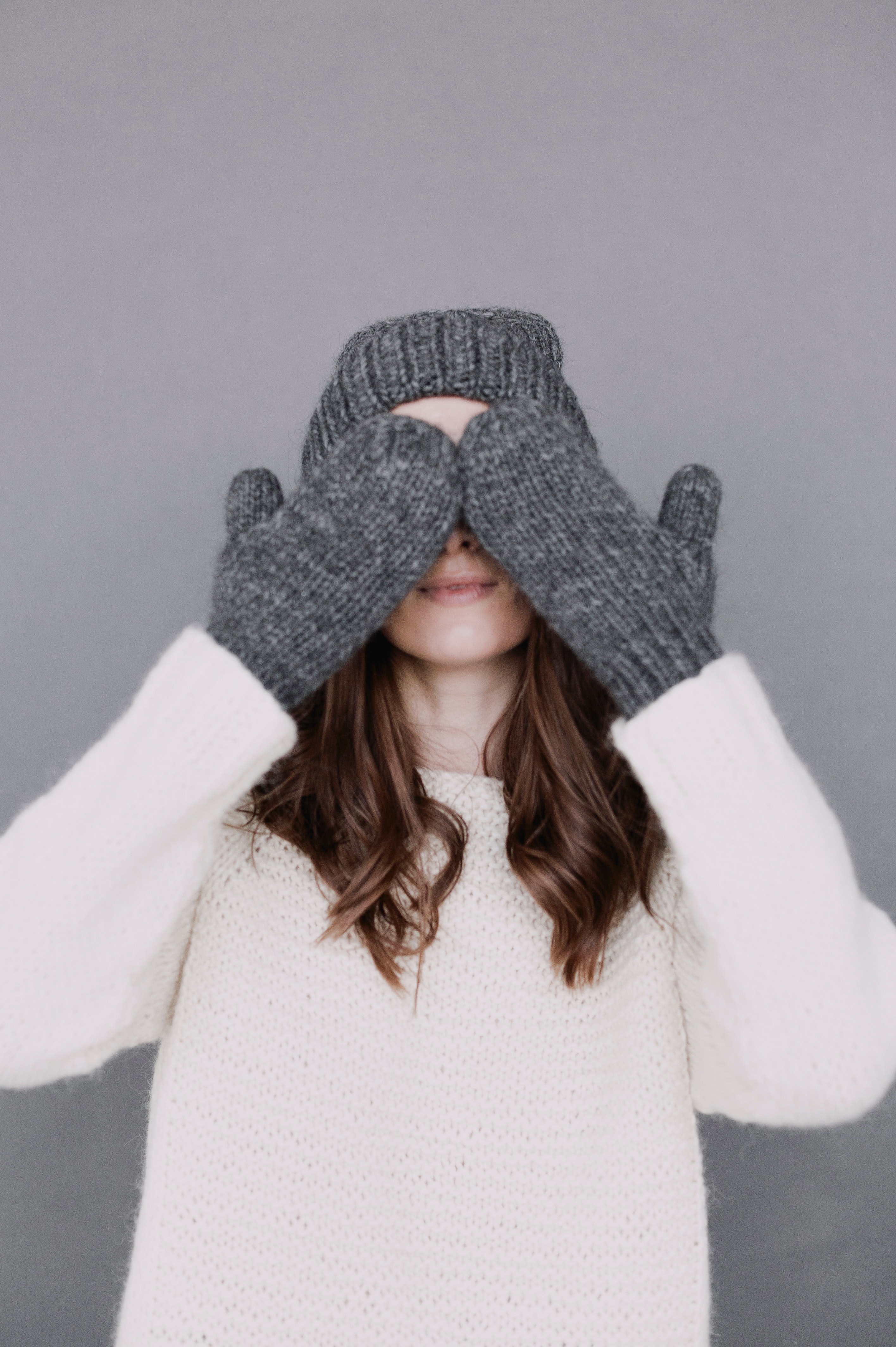 Woman covering her eyes with her hands photo