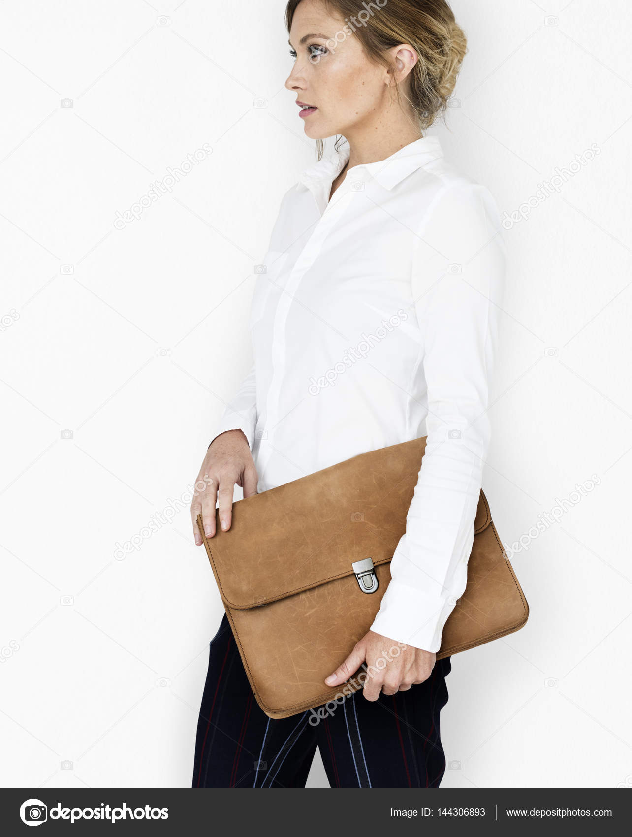 Business Woman Holding Bag — Stock Photo © Rawpixel #144306893