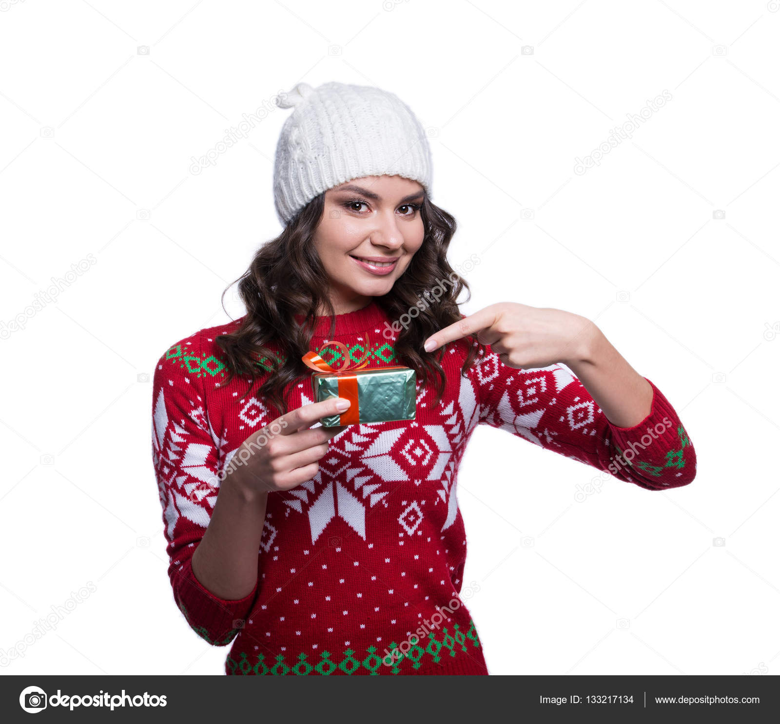 Smiling pretty sexy young woman wearing colorful knitted sweater ...