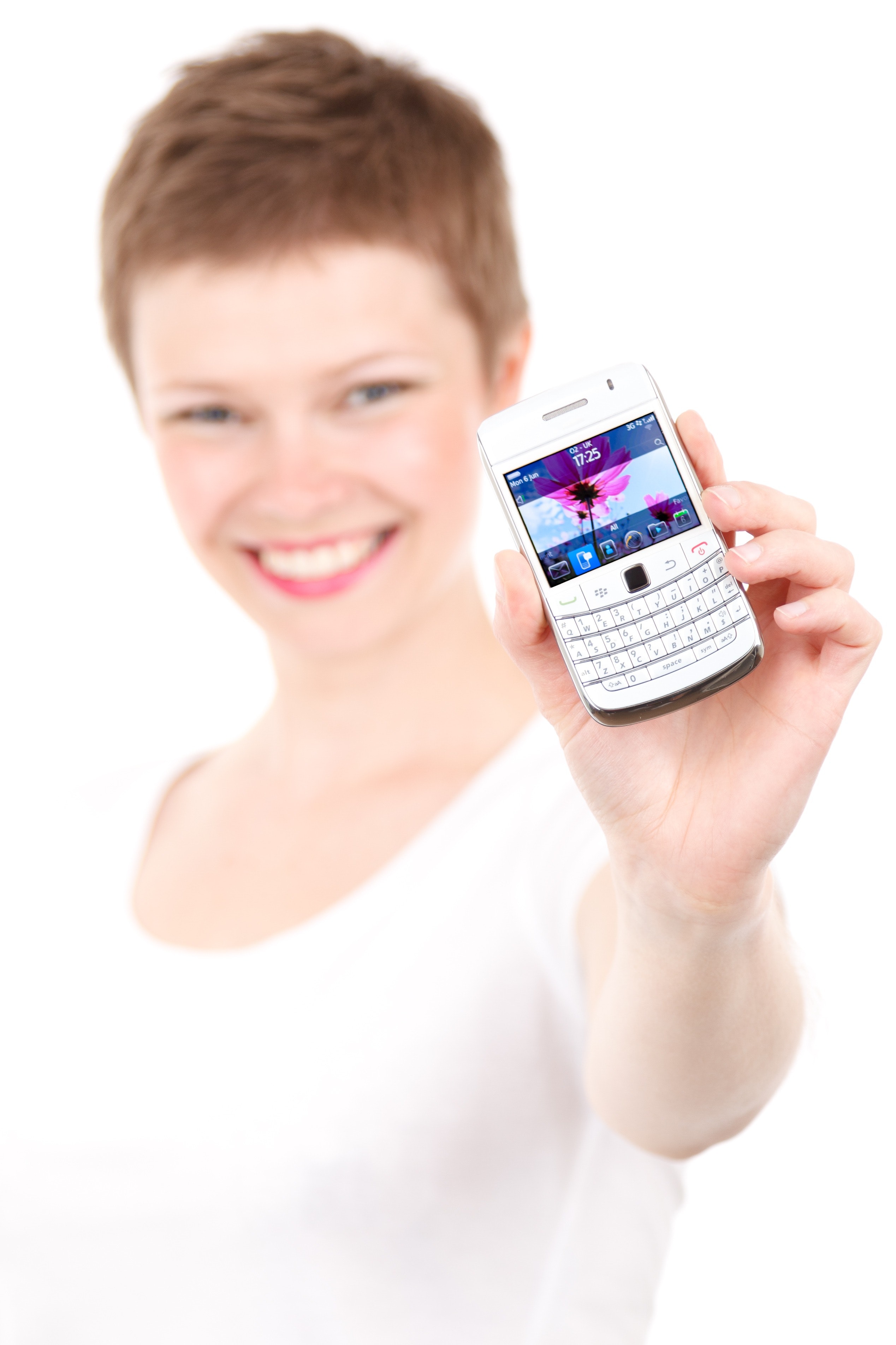 Woman holding white qwerty phone photo