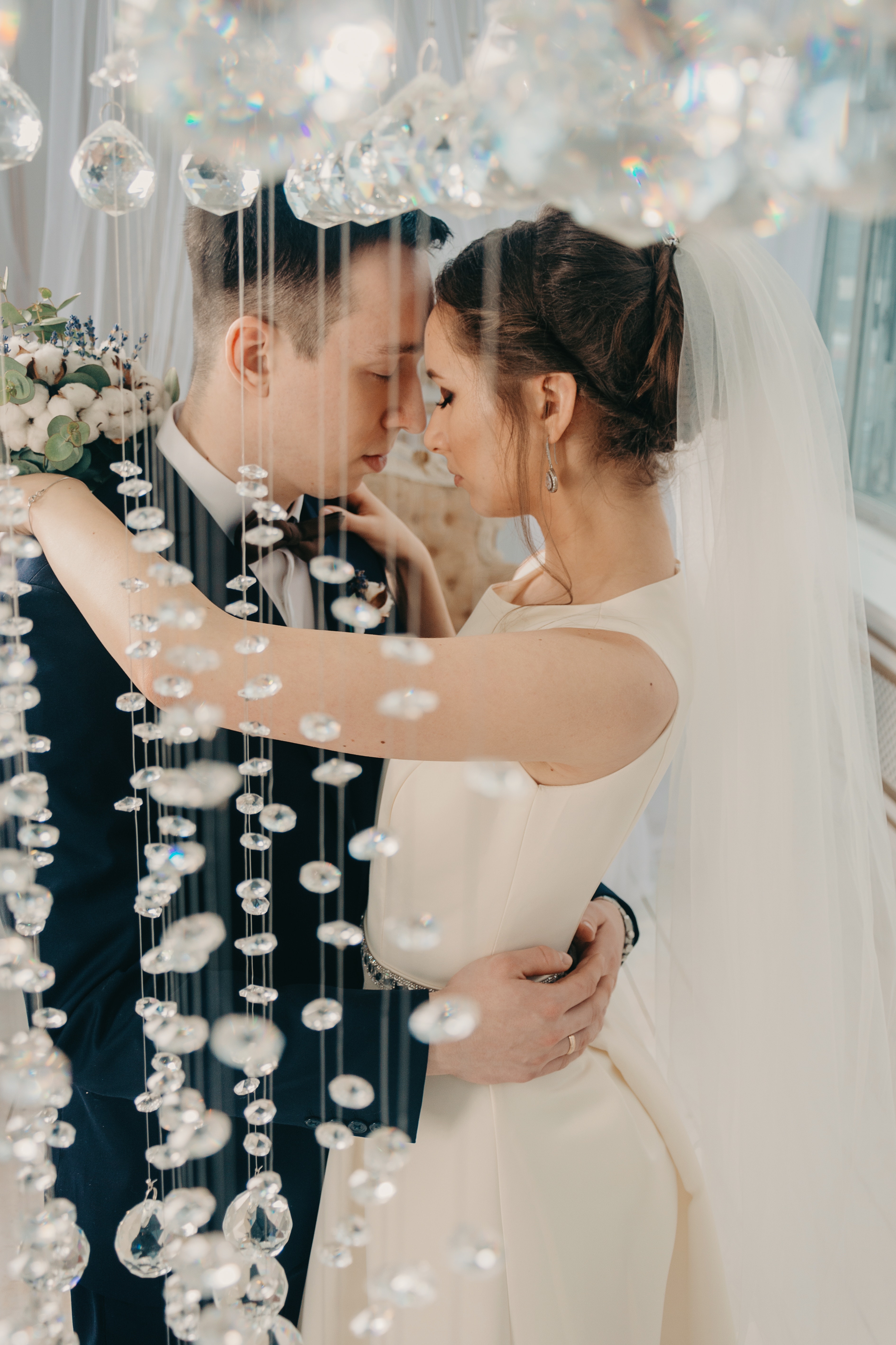 Woman hugging man on wedding photo