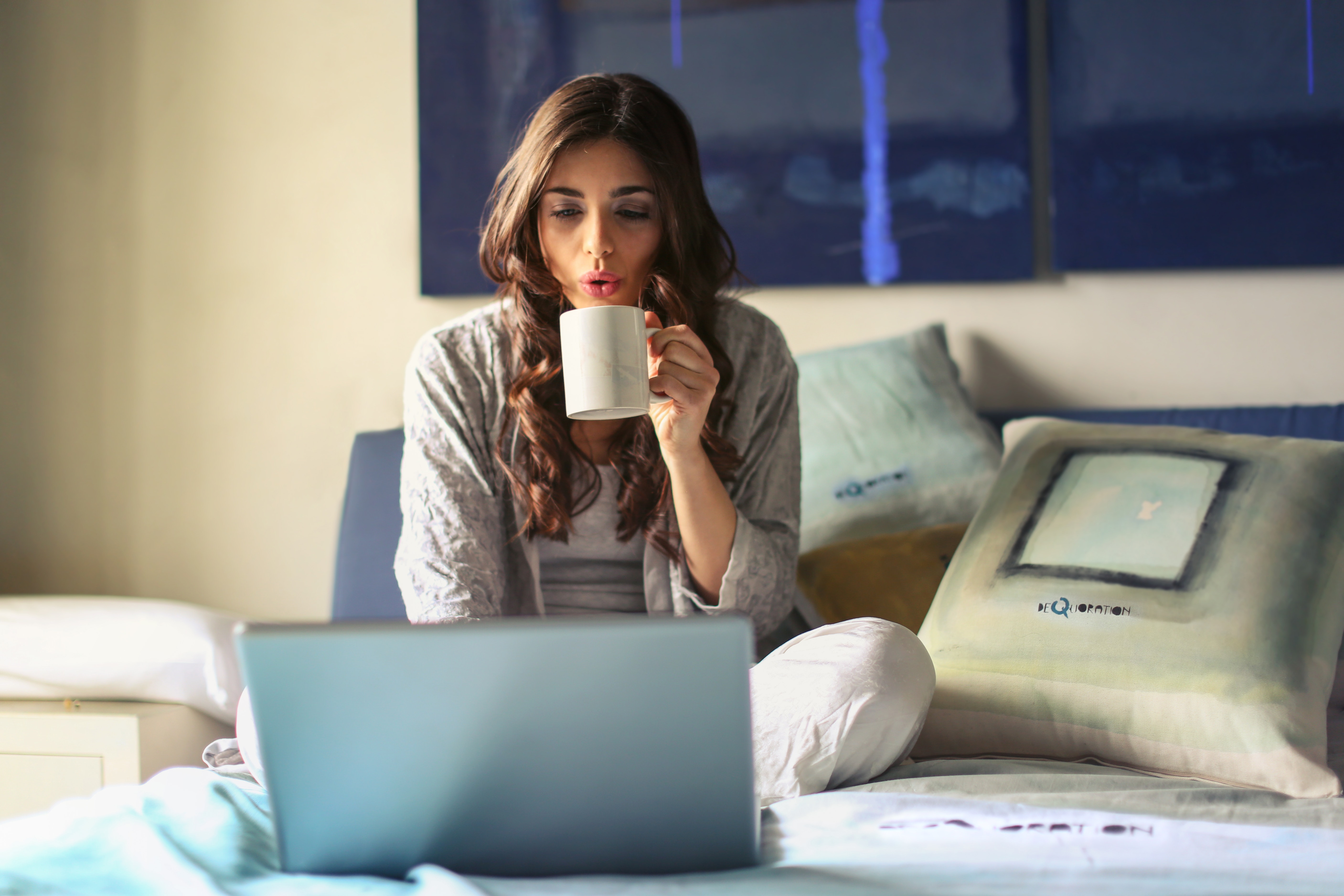 Woman in Grey Jacket Sits on Bed Uses Grey Laptop, Home, Work, Woman, Technology, HQ Photo