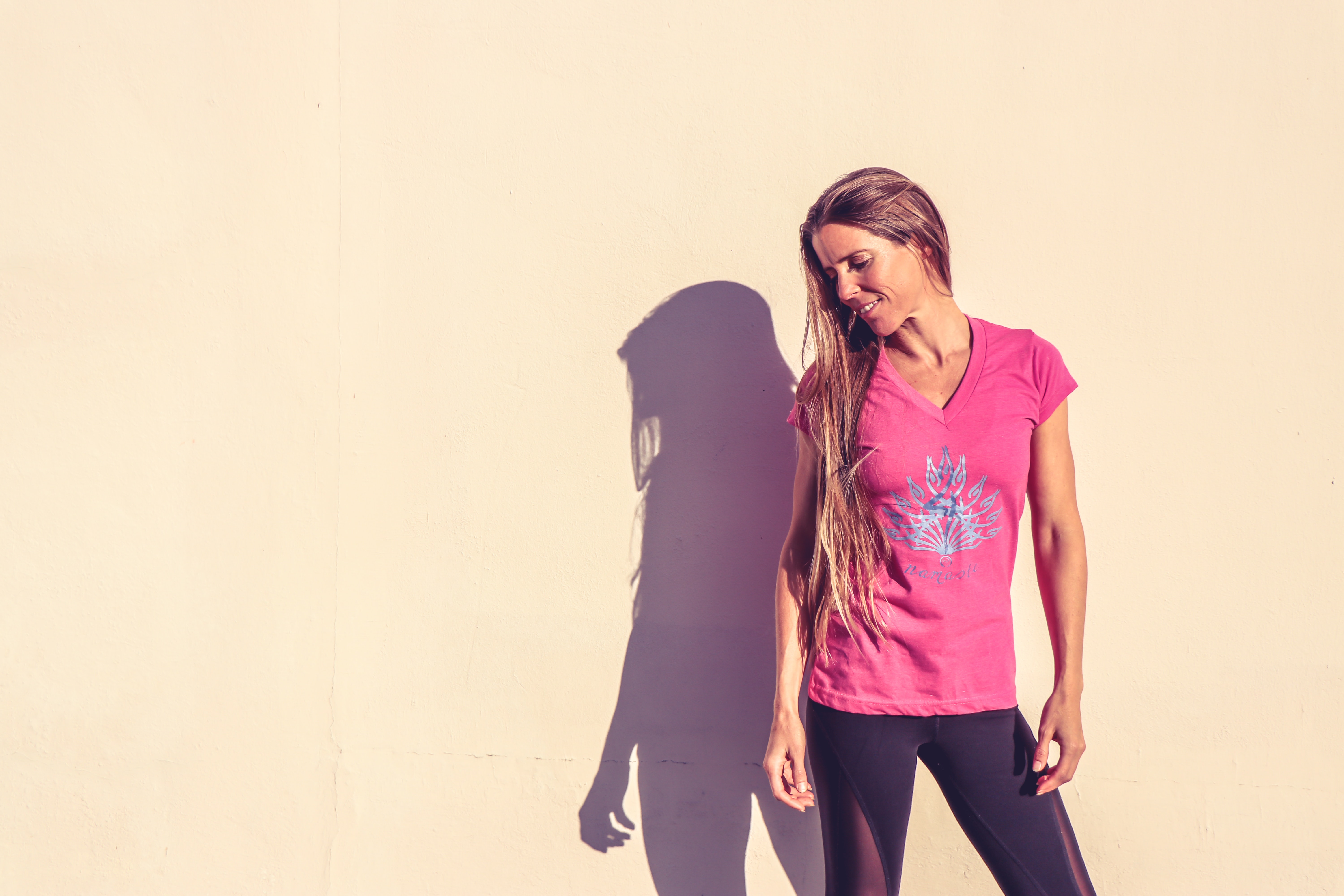 Woman in Pink V-neck Cap-sleeved Shirt Standing Near Wall, Casual, Person, Woman, Wear, HQ Photo