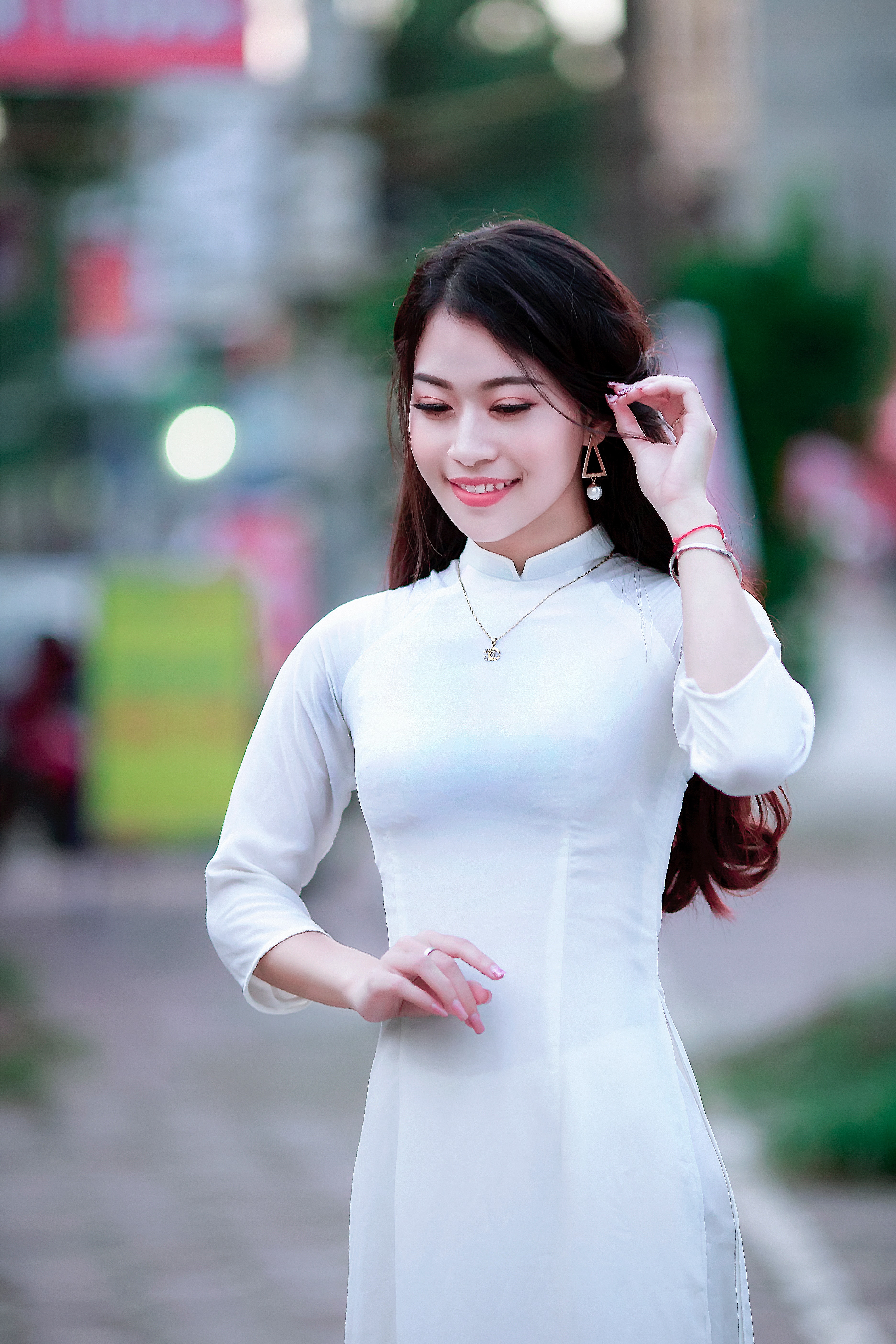 Woman in white dress photo