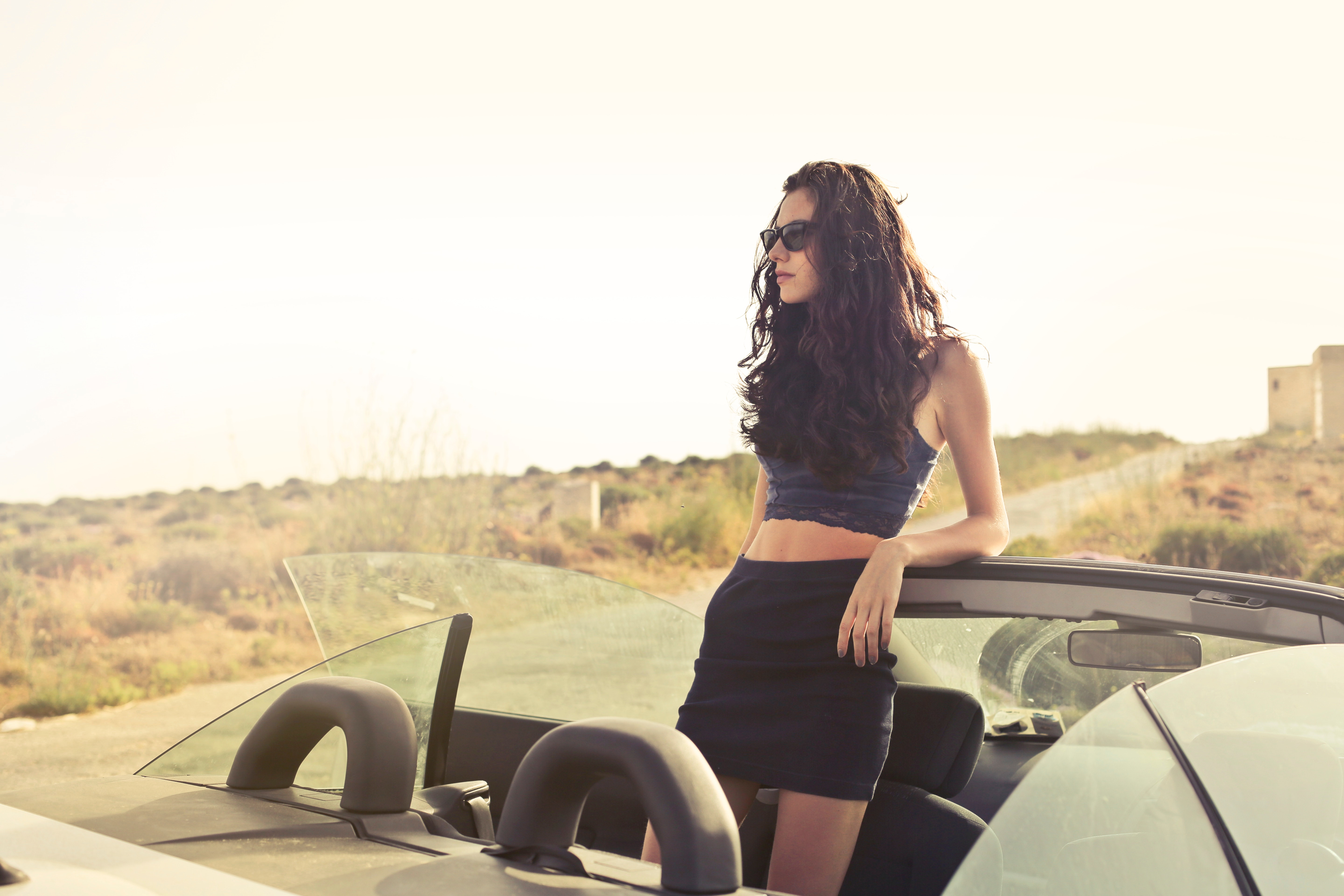 Woman Standing Leaning at Convertible Car · Free Stock Photo