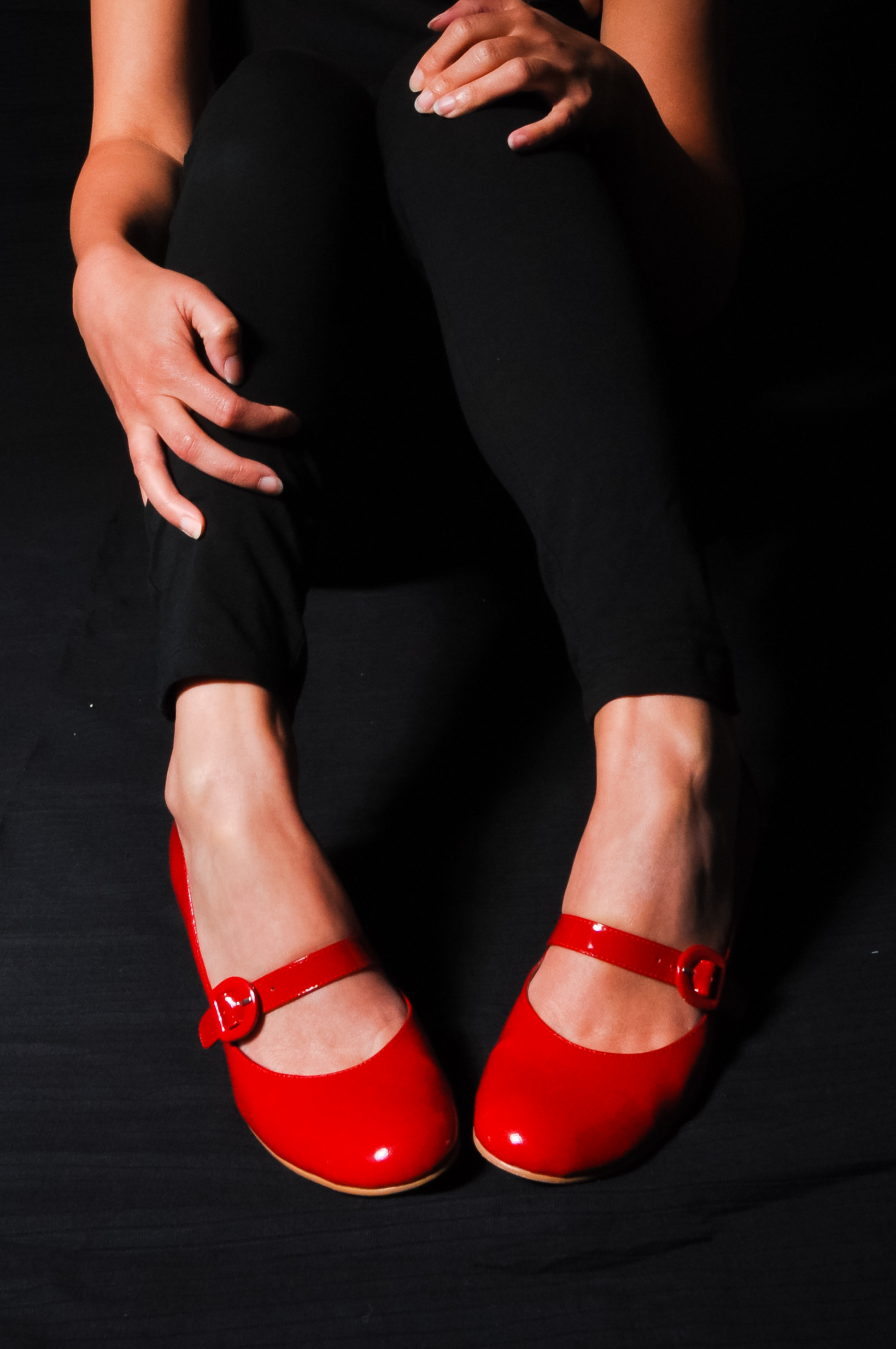 Woman legs in red high heel shoes photo