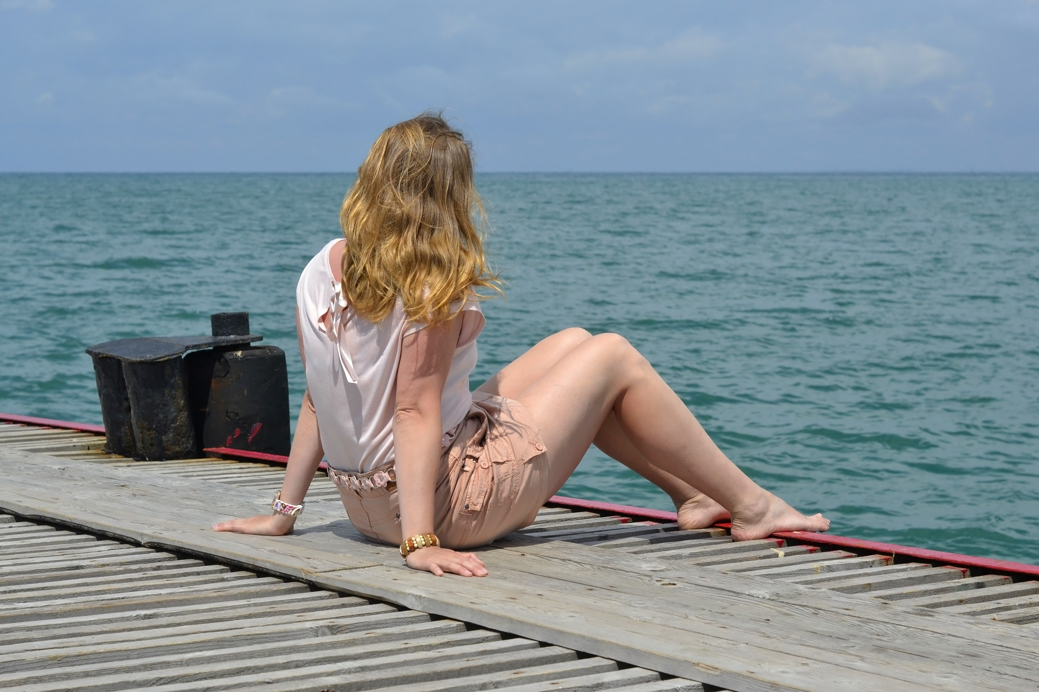 Woman on the dock photo