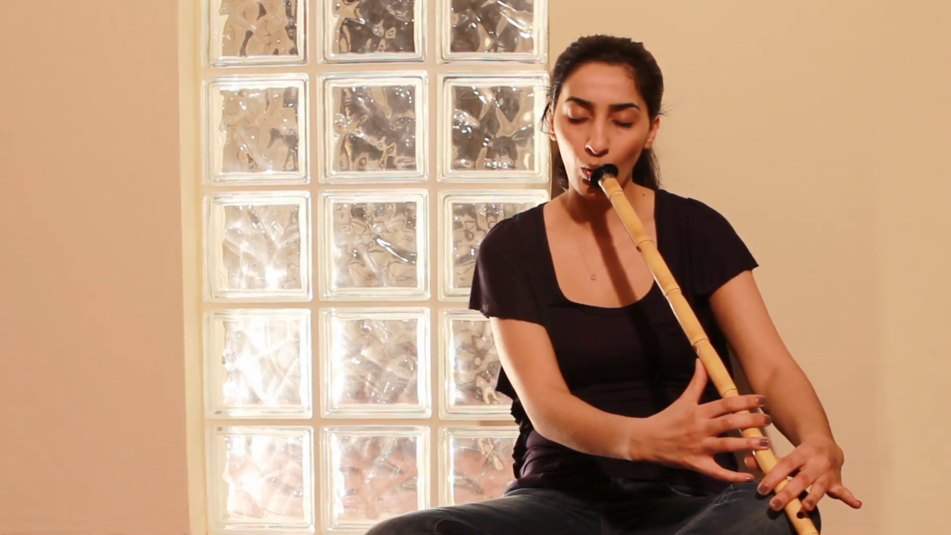 young woman playing flute Stock Video Footage - VideoBlocks