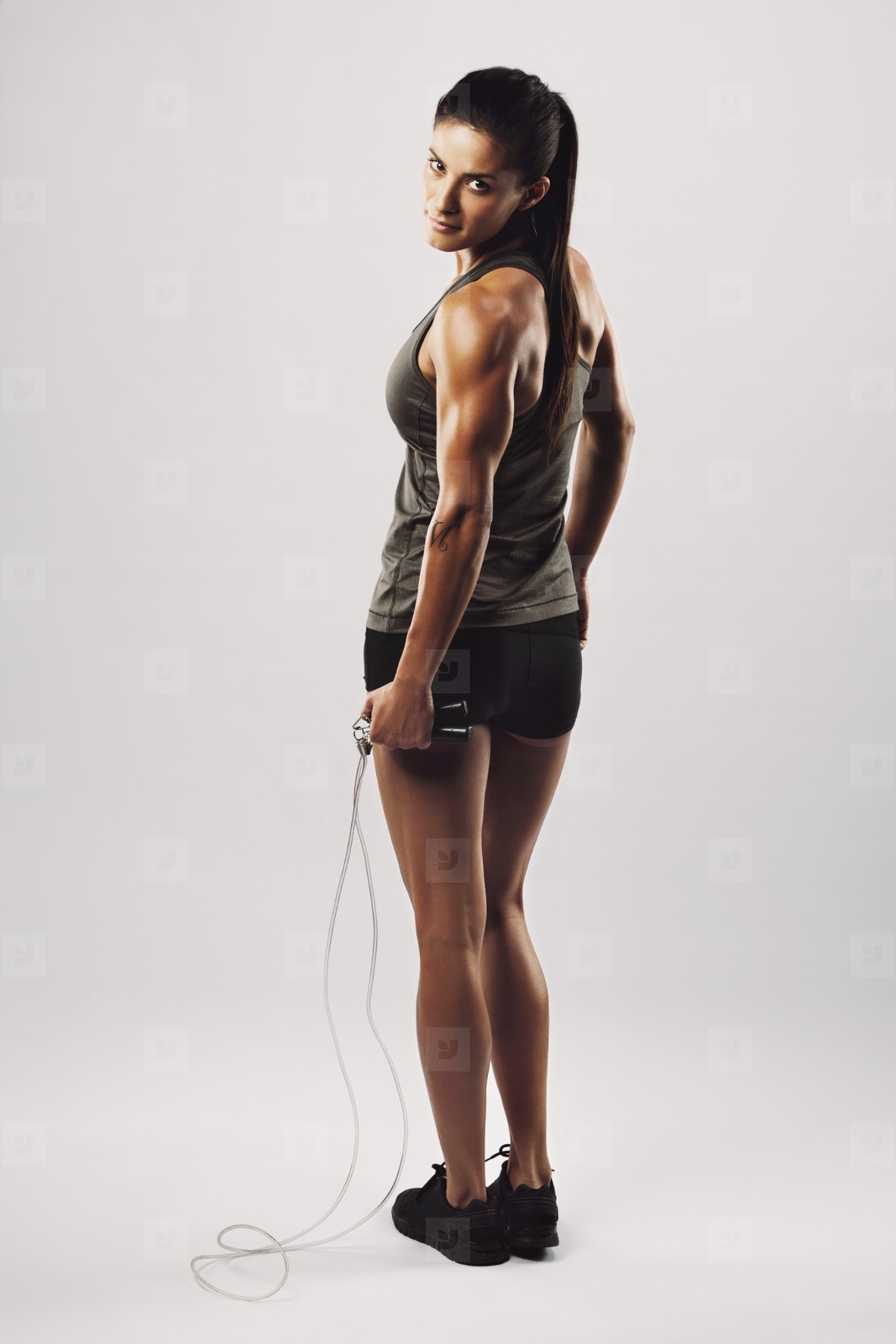 Photos - Fitness woman posing with skipping rope - YouWorkForThem