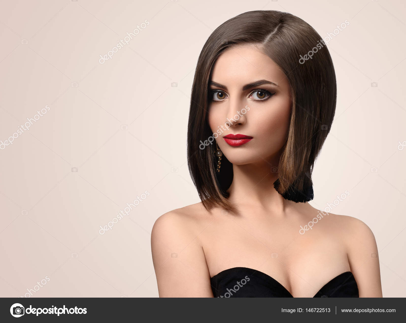 Beautiful elegant young woman posing in studio — Stock Photo ...