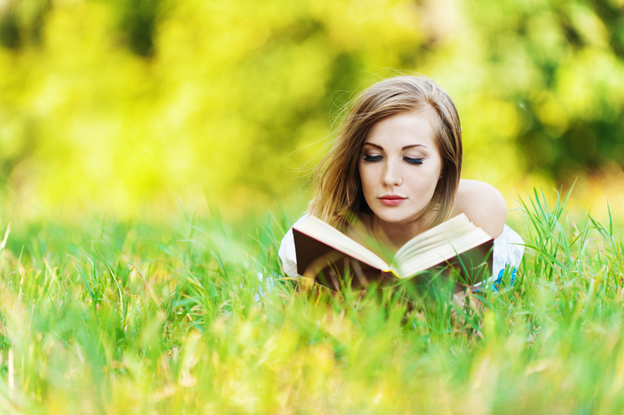 littlecurlewpress | woman grass reading book