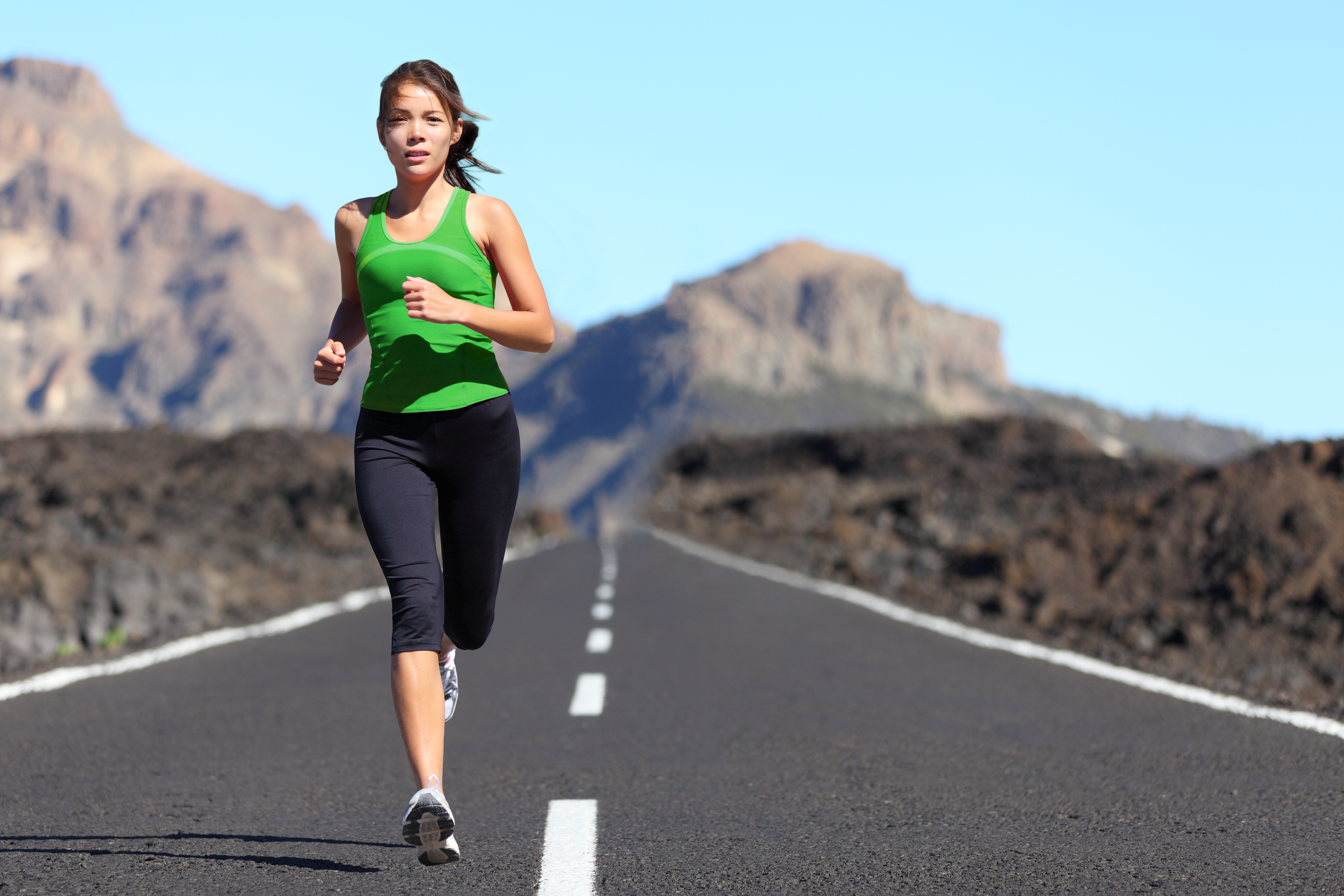 Runner woman running - Inspire Podiatry
