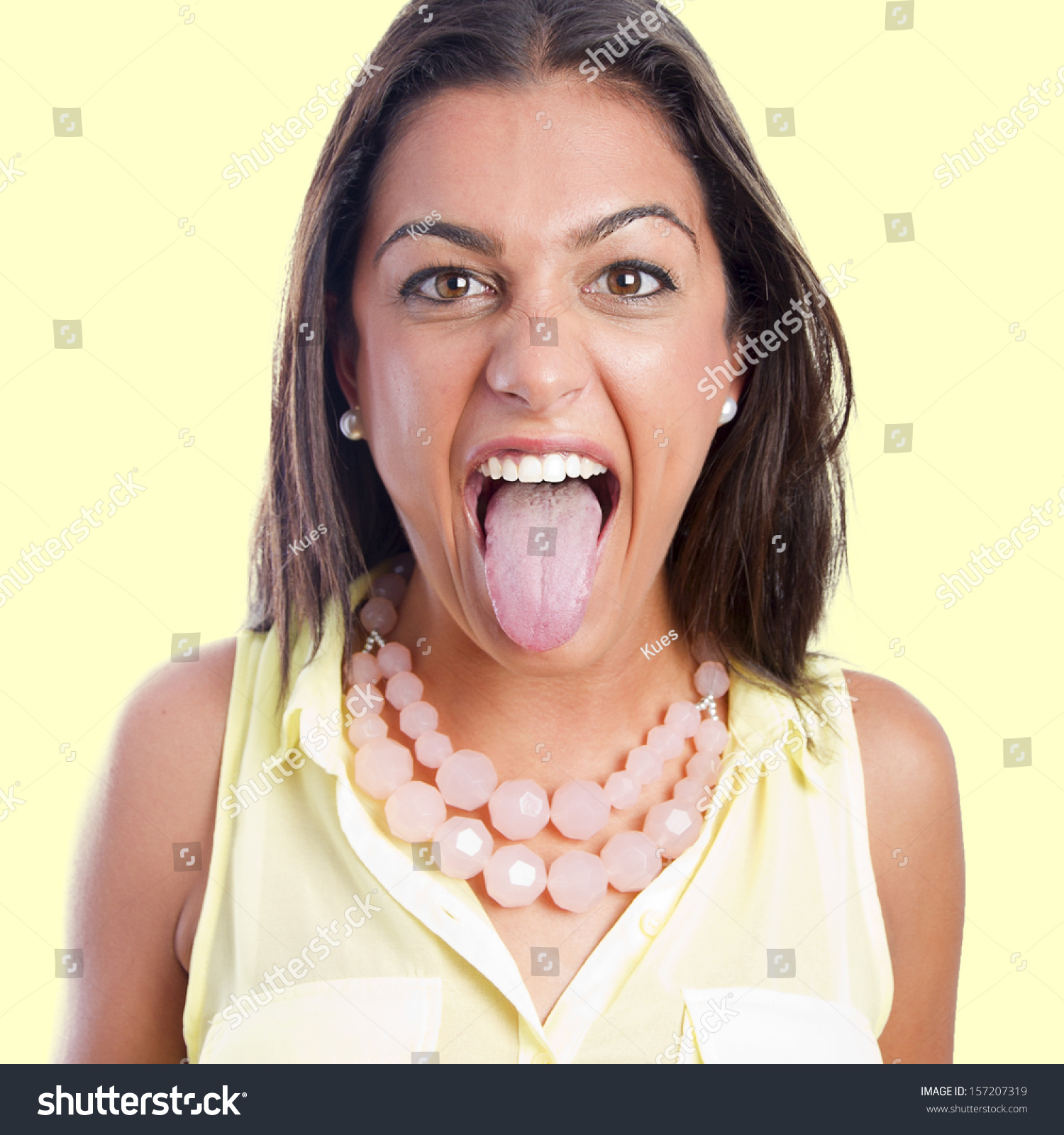 Pretty Woman Showing Her Tongue Stock Photo (Royalty Free) 157207319 ...
