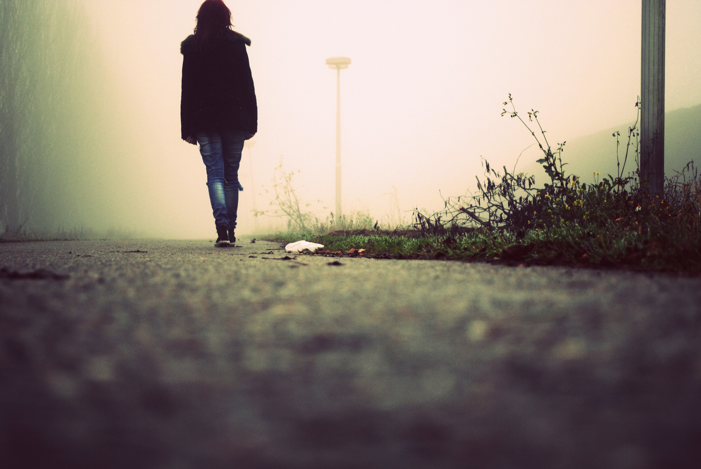woman walking away