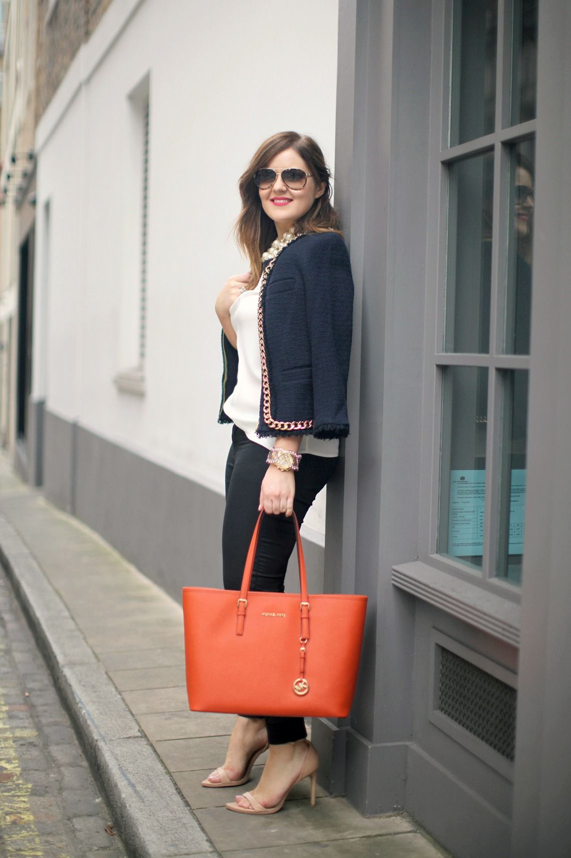 I like the tailored look of the cardigan, and the pop of color from ...