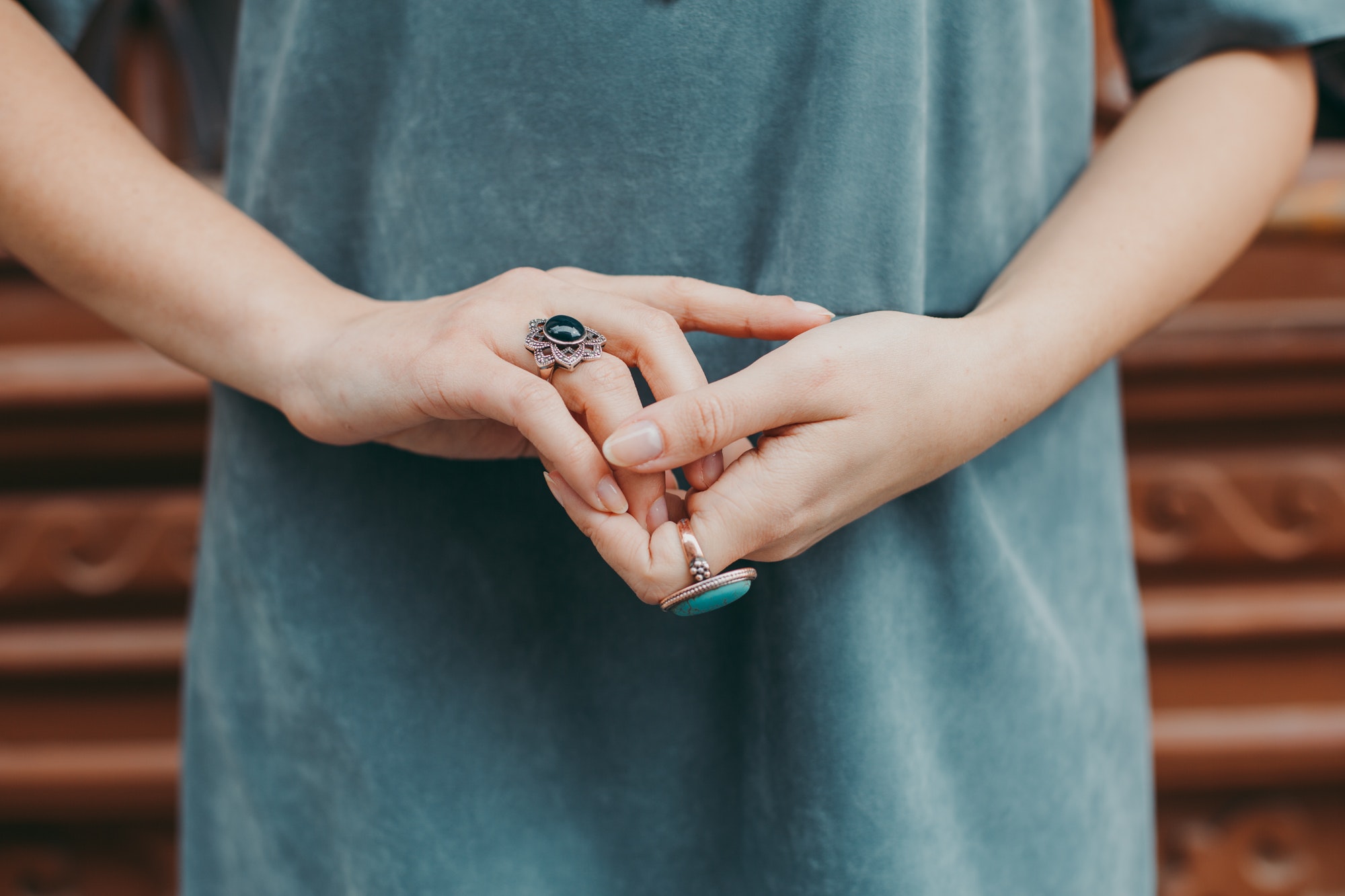 Woman wearing blue gemstone ring photo
