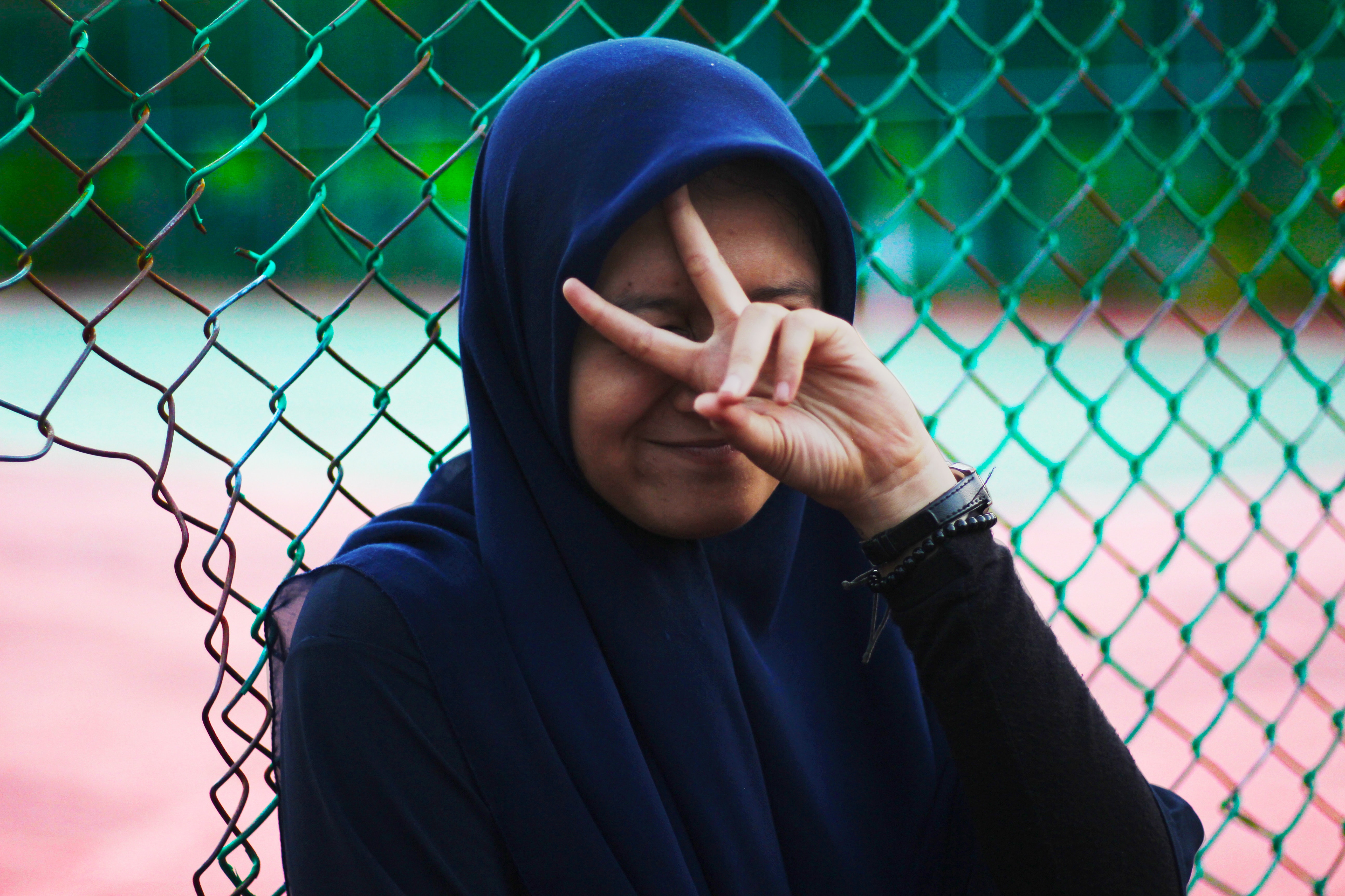 Woman wearing blue hijab photo