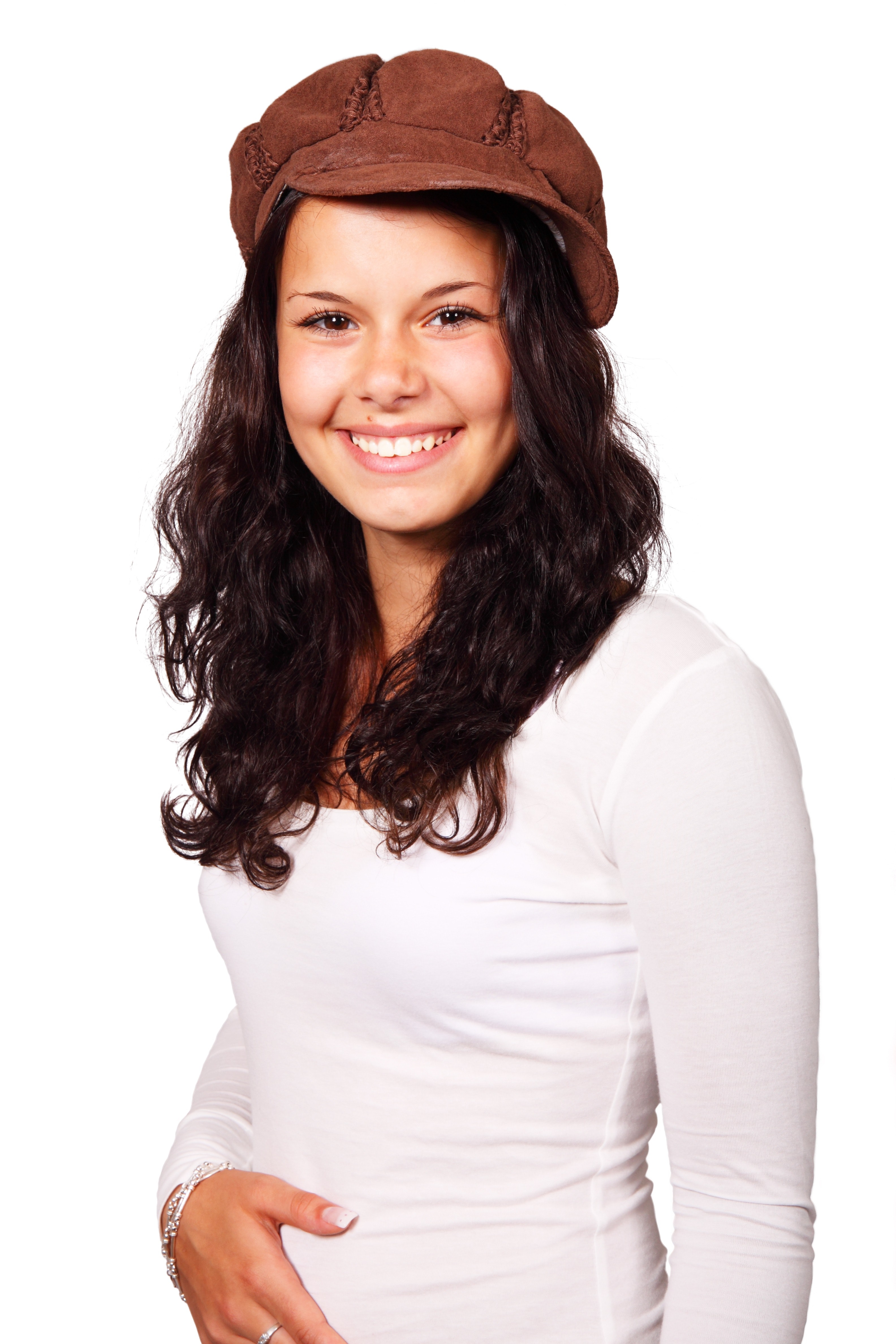 Woman wearing brown cap and white long sleeve shirt photo