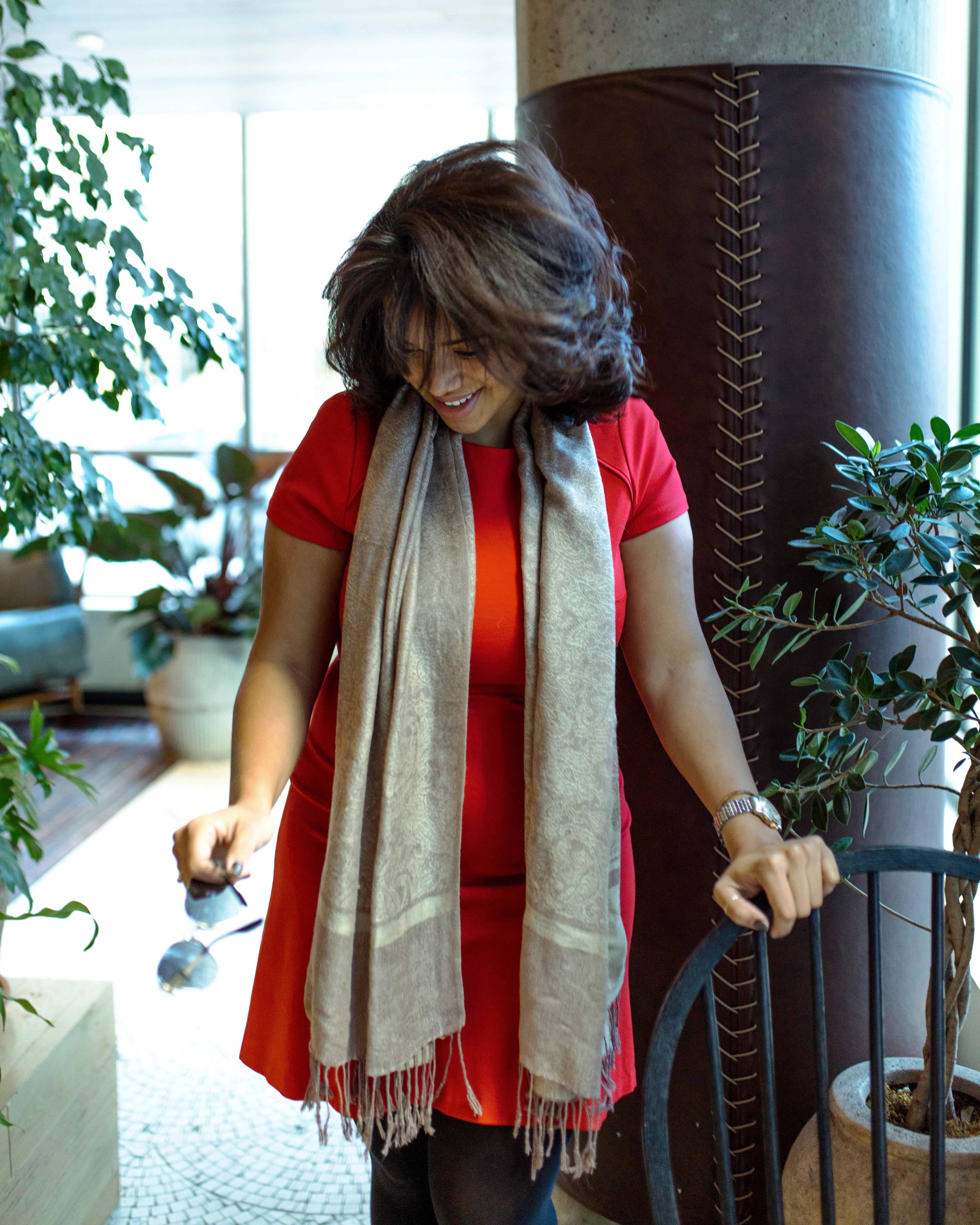Woman wearing gray scarf photo