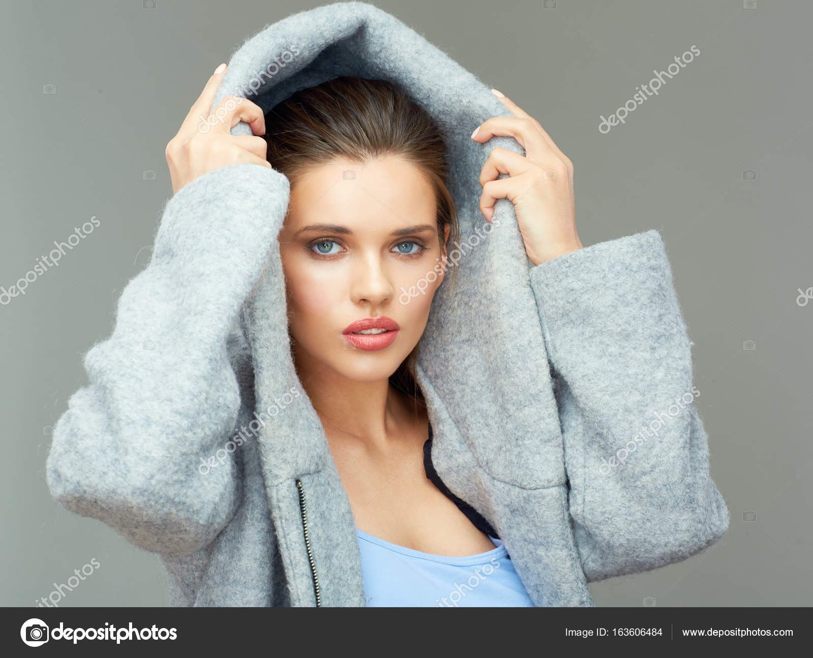 woman wearing deep coat hood — Stock Photo © sheftsoff #163606484