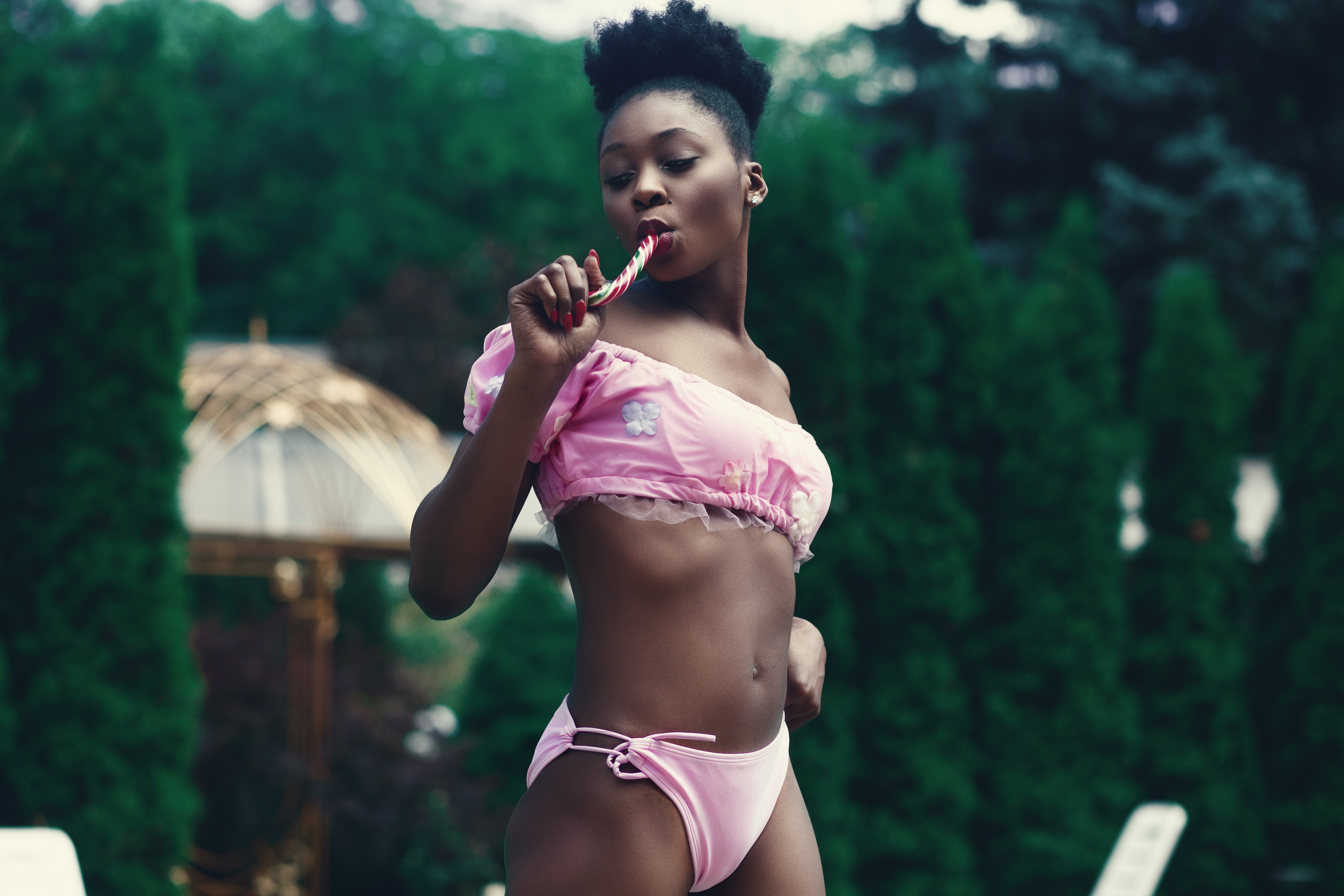 Woman wearing pink bikinis photo